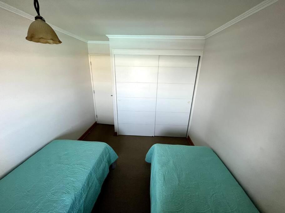 apartamento con vista al mar y piscina.