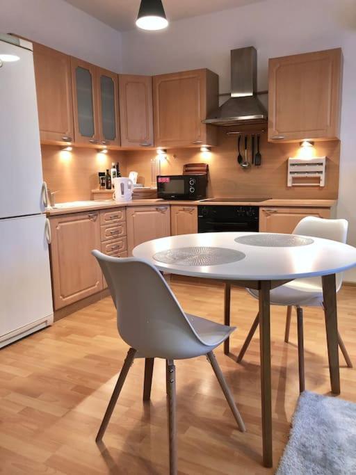 Modern & cozy apartment near hockey & football arena view 5