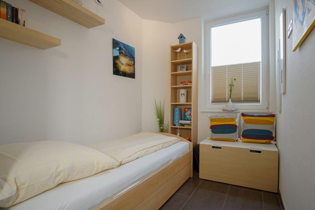Strandpark-Grossenbrode-Haus-Kuestenzauber-Wohnung-15-KAePTNs-KAJUeTE view 2