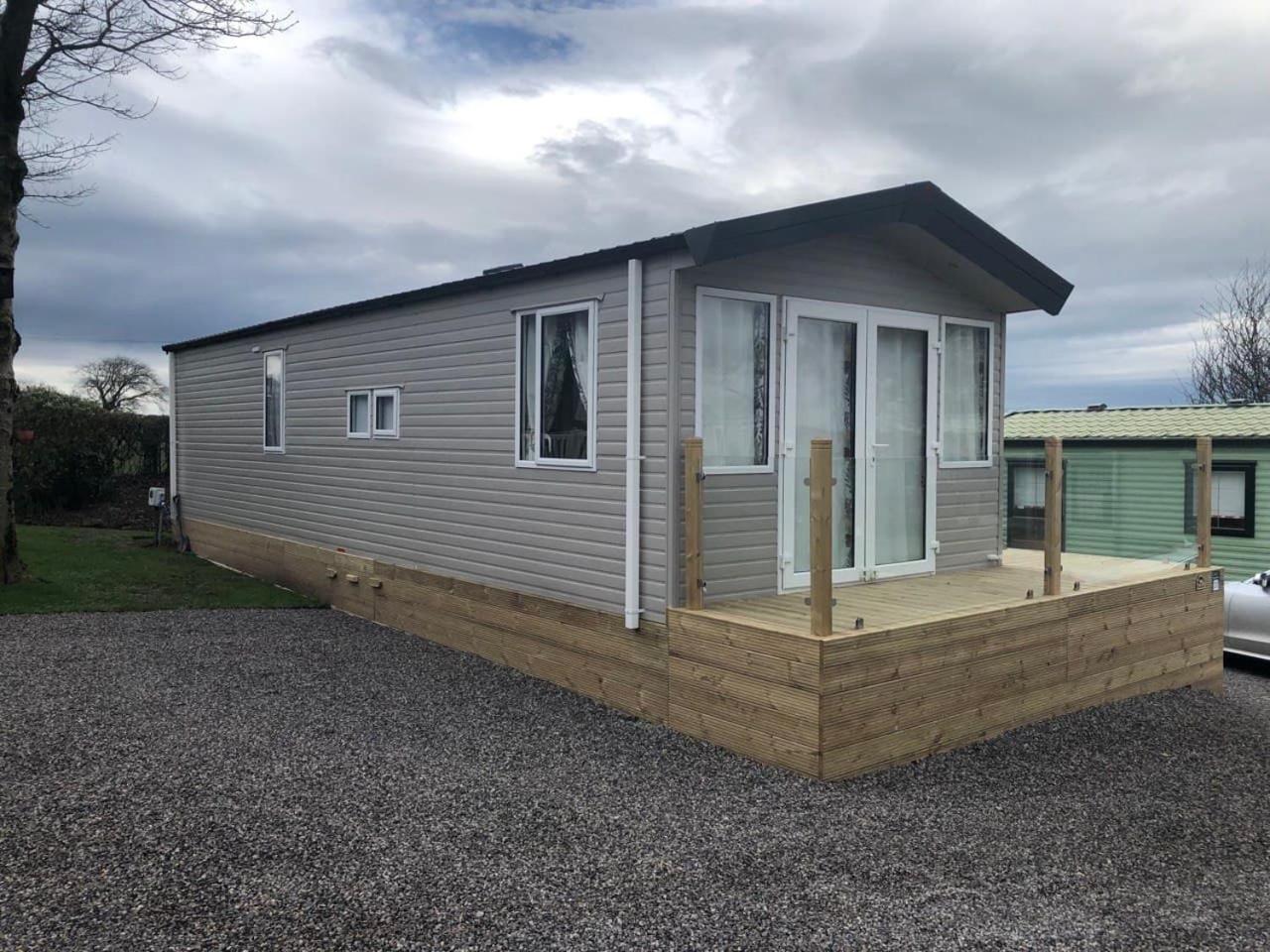 Delightful 2-bed static set in a peaceful village view 2