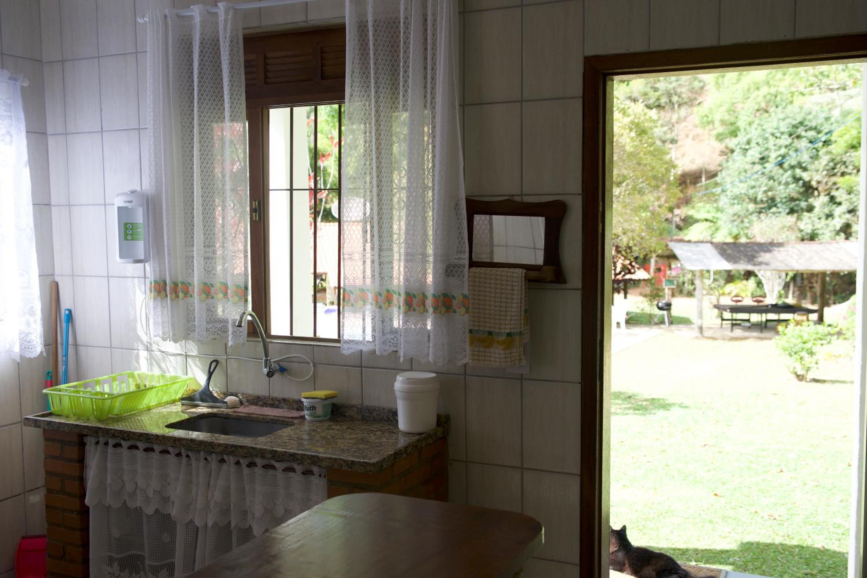 Casa em Friburgo com piscina, lareira, 1 suíte e 1 quarto