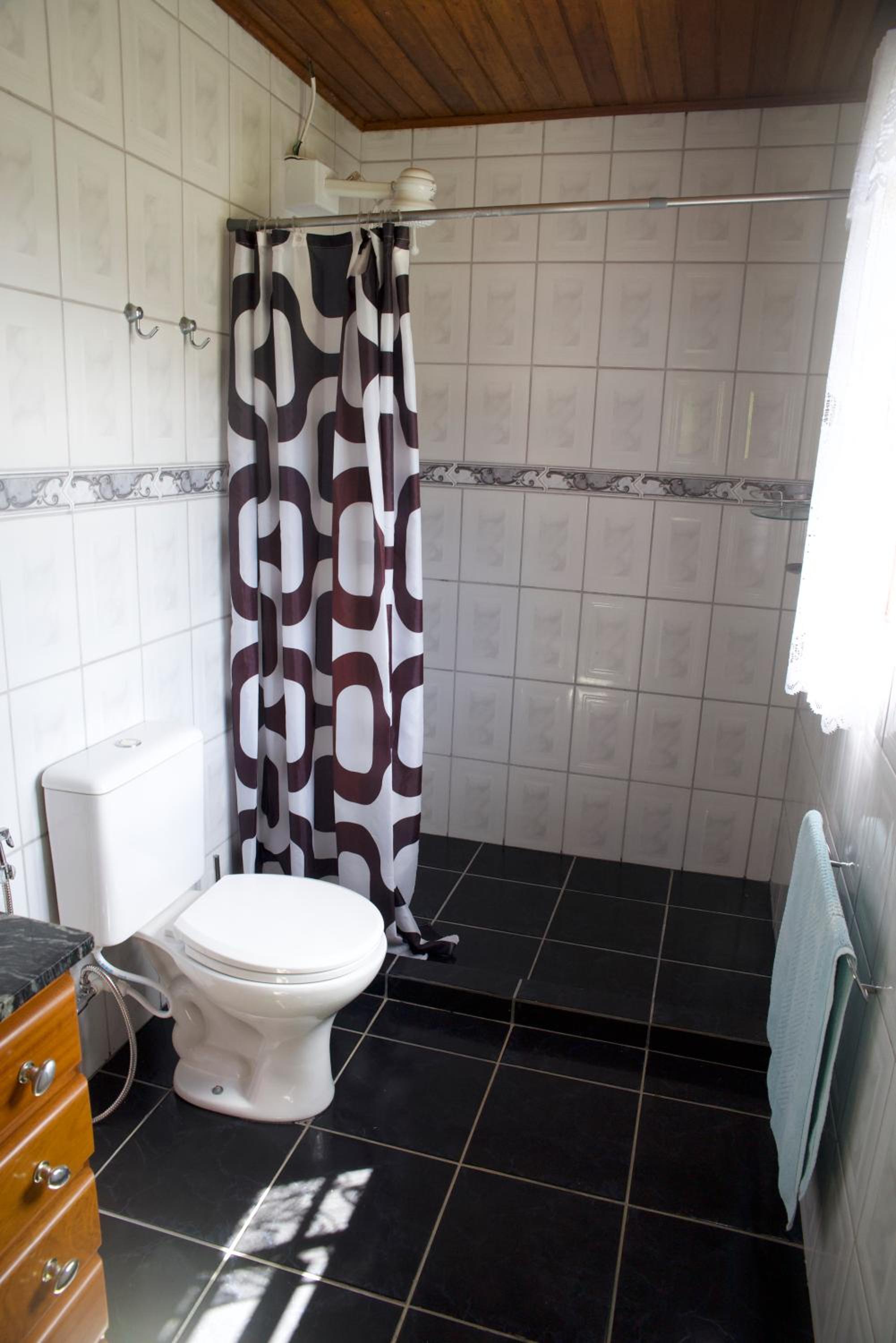 Casa em Friburgo com piscina, lareira, 1 suíte e 1 quarto