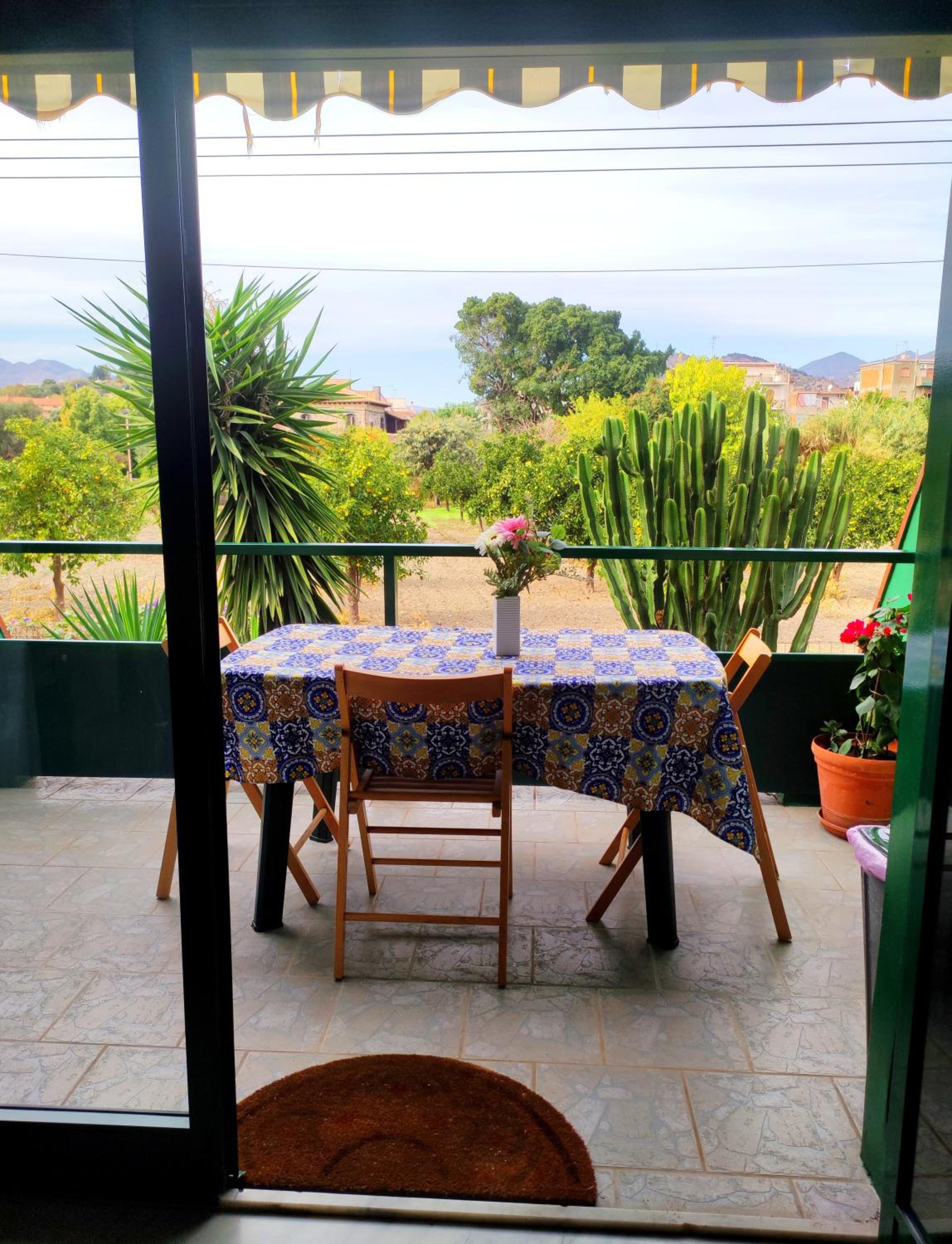 Casa dei Fiori con la vista a Taormina view 2