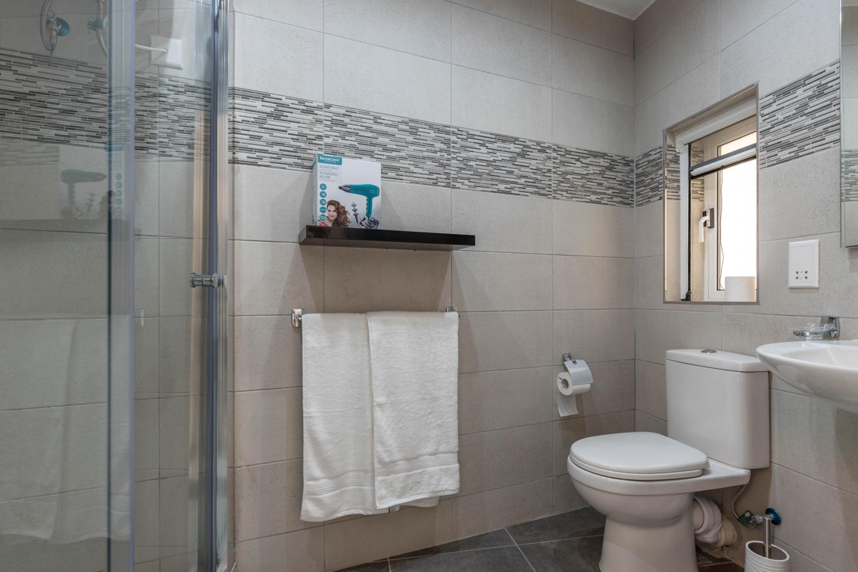 Sliema Bedrooms with ensuite bathrooms