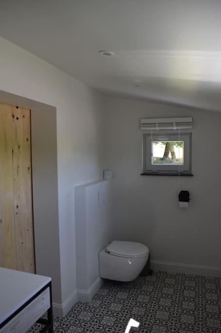 Cosy Cott, een verborgen logeerplek in het landelijke Poeke.
