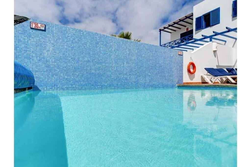 Villa Optimist Rubicón piscina climatizable, frente al mar