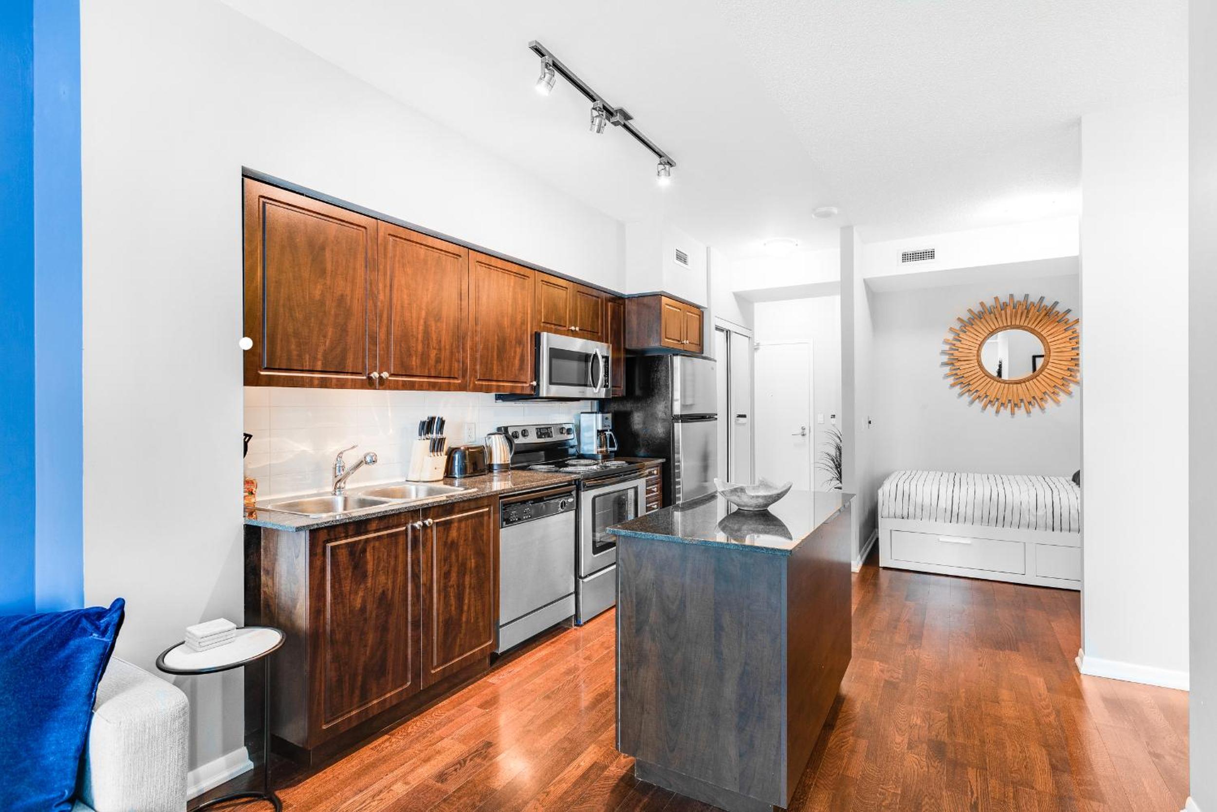 AOC Suites - High-Rise Condo - City View - Image 5