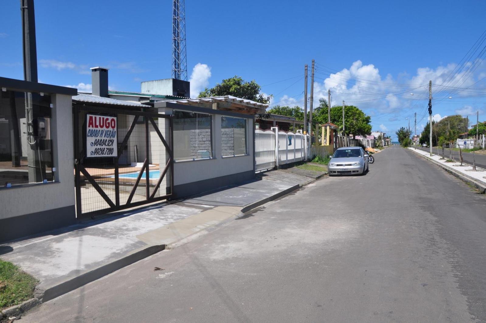 Casa com piscina, Ar condicionado, Pertinho Do Mar Em Capão Da Canoa