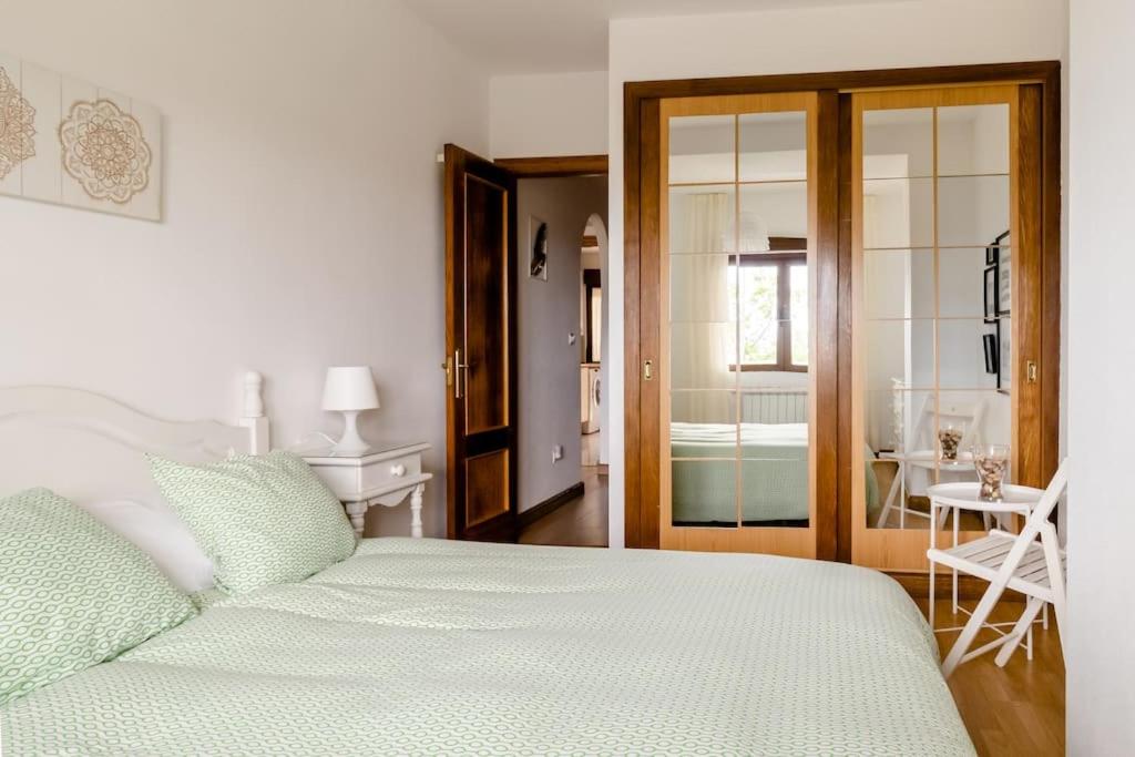 Casa de Las Flores - Apartamento con jardín privado frente a la Playa de Comillas view 3