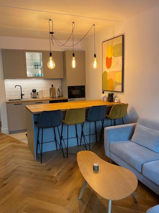Modern 2-bedroom apartment with terrace & free parking view 2