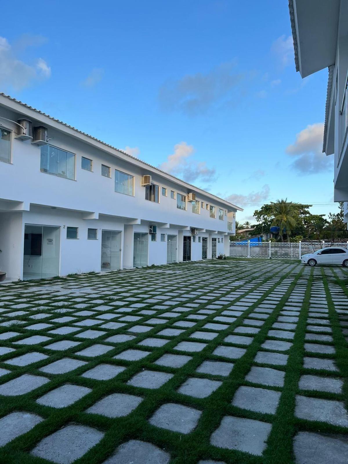 Casa para temporada 50m da praia em Condomínio 2 Suítes Ar Wi-Fi Rápida Ideal para Família