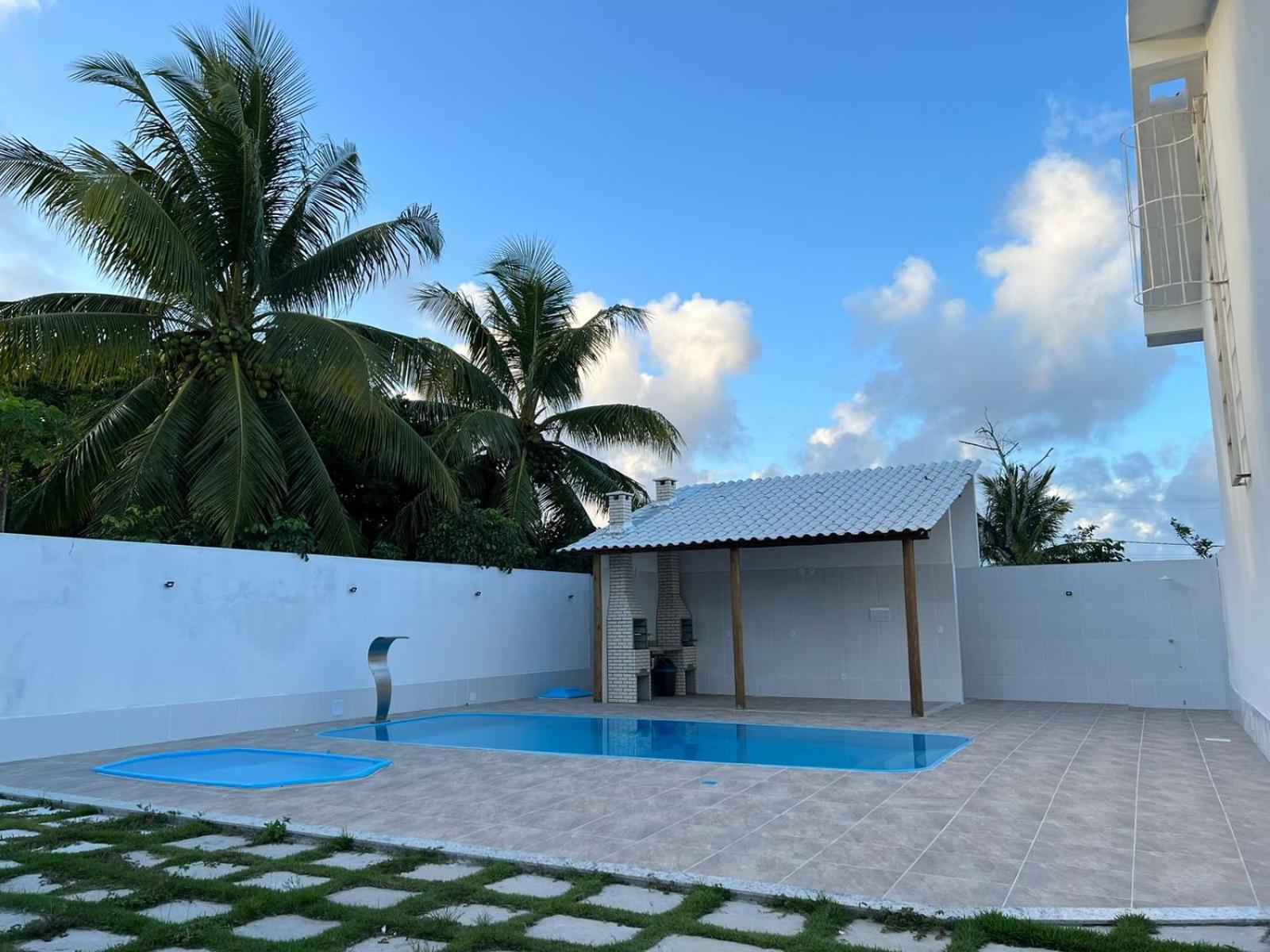 Casa para temporada 50m da praia em Condomínio 2 Suítes Ar Wi-Fi Rápida Ideal para Família