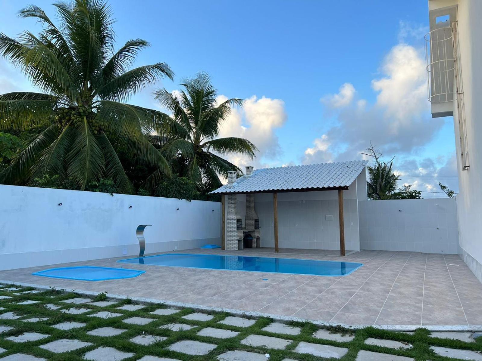 Casa para temporada 50m da praia em Condomínio 2 Suítes Ar Wi-Fi Rápida Ideal para Família