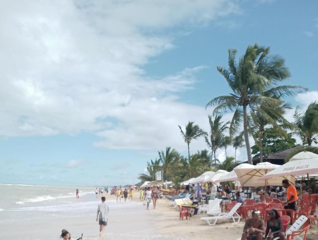 Casa para temporada 50m da praia em Condomínio 2 Suítes Ar Wi-Fi Rápida Ideal para Família