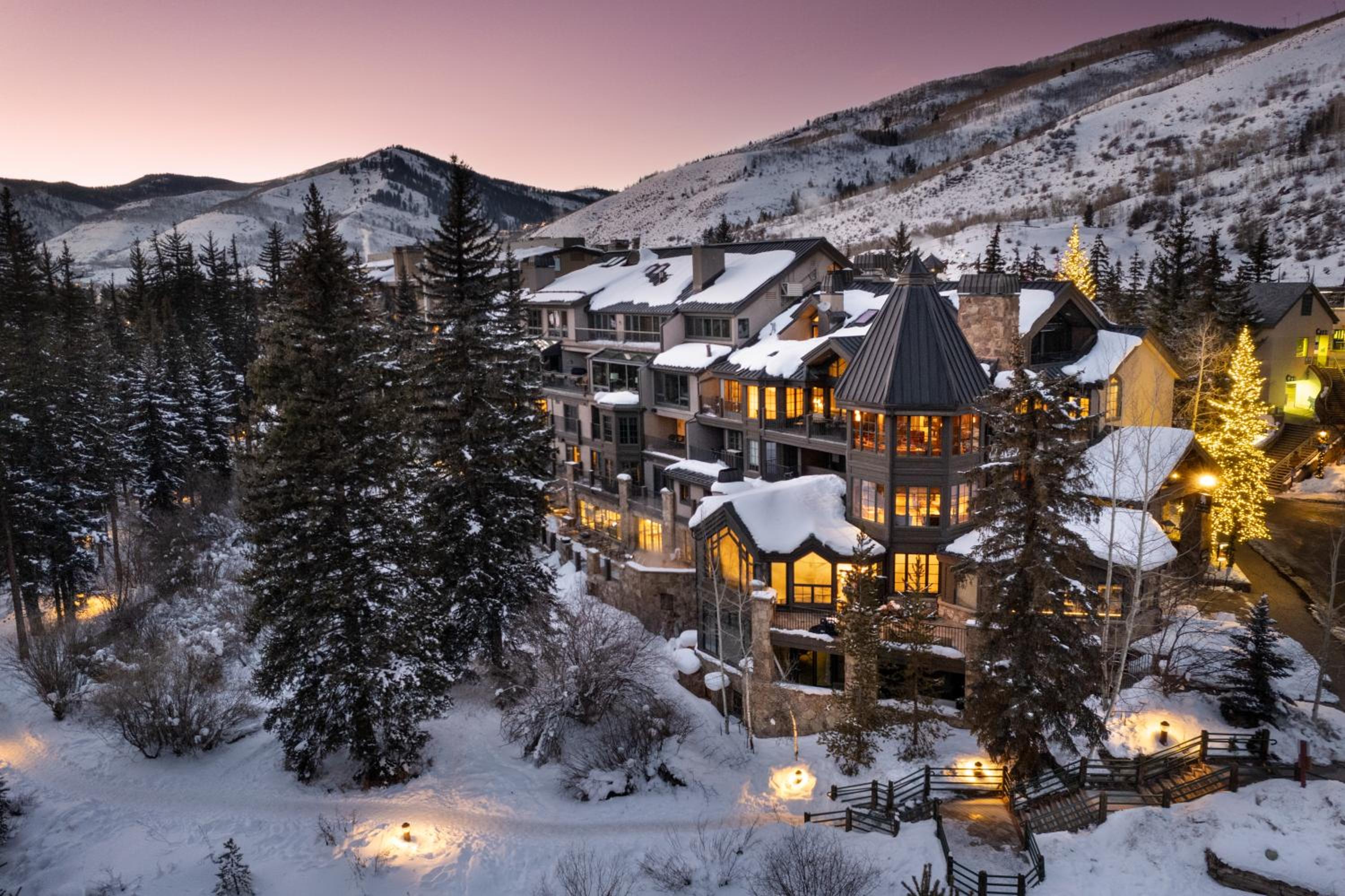 Exterior snow-covered view of Gravity Haus vail