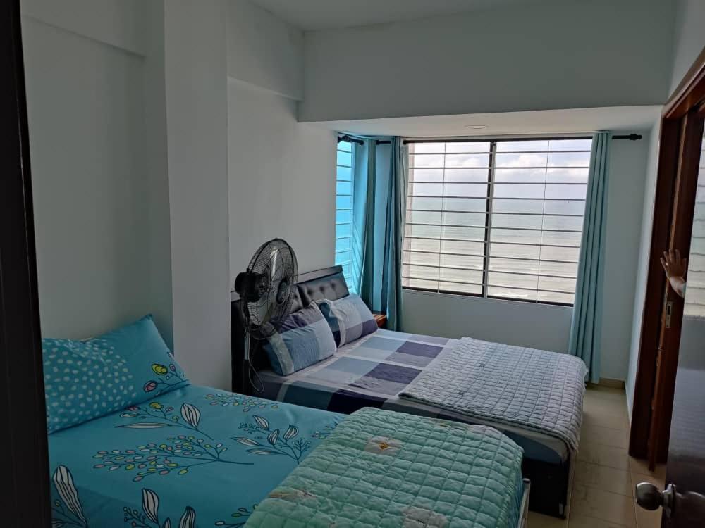 PD Paradise Lagoon Apartment North B-2-6 photo 4