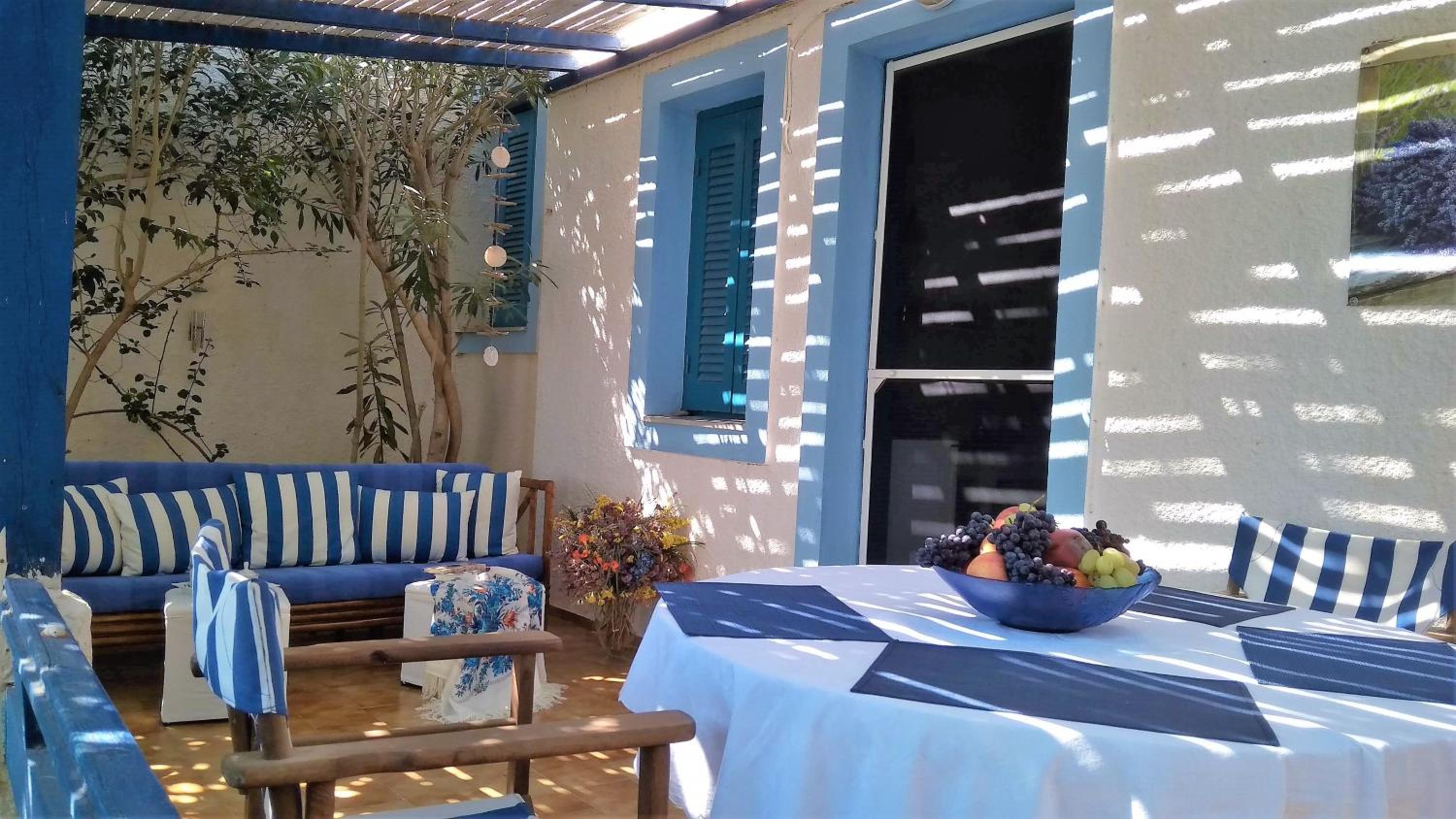 A Cretan house in a garden,overlooking the sea. view 4