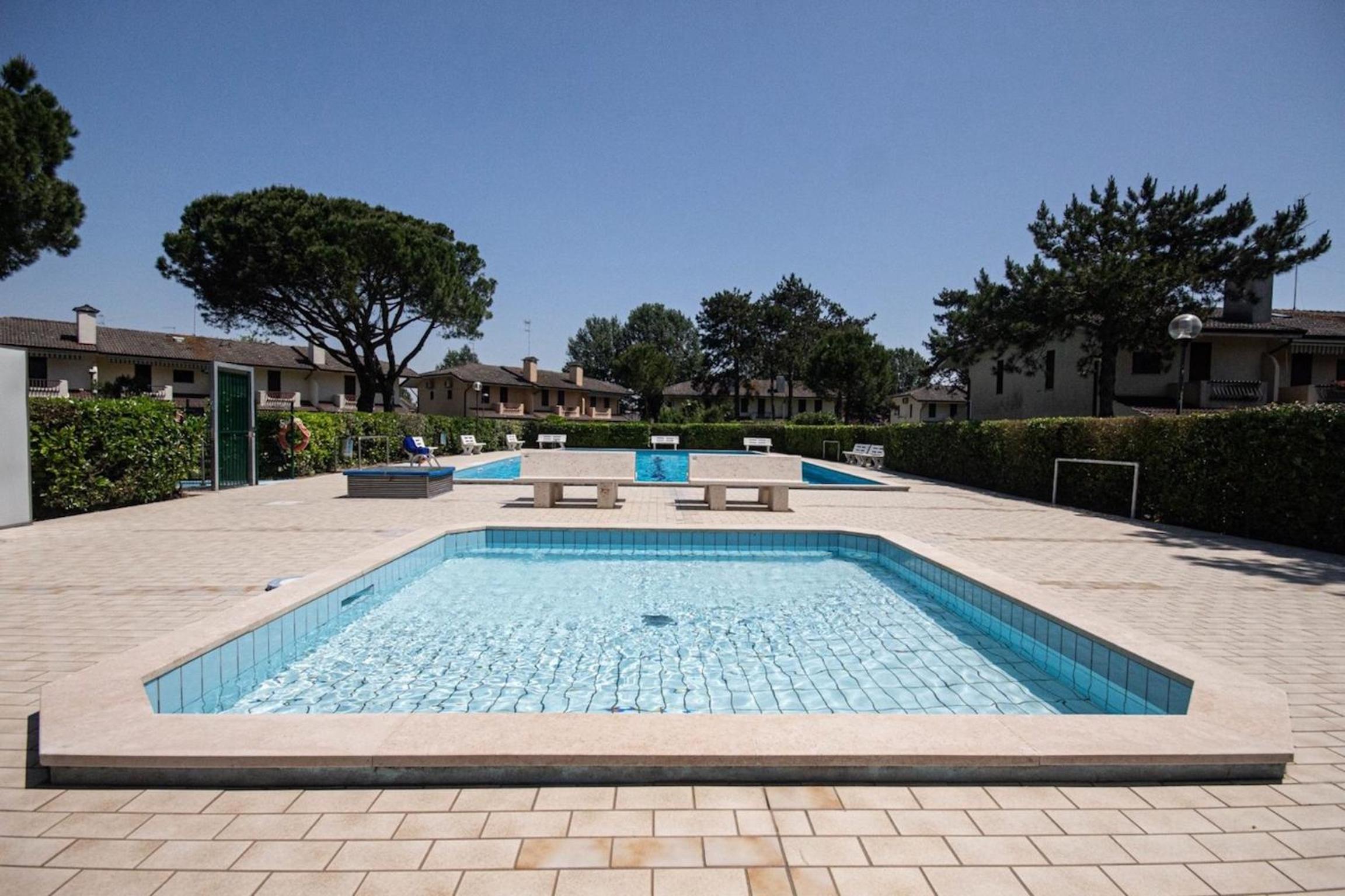 Holiday home with garden and shared pool