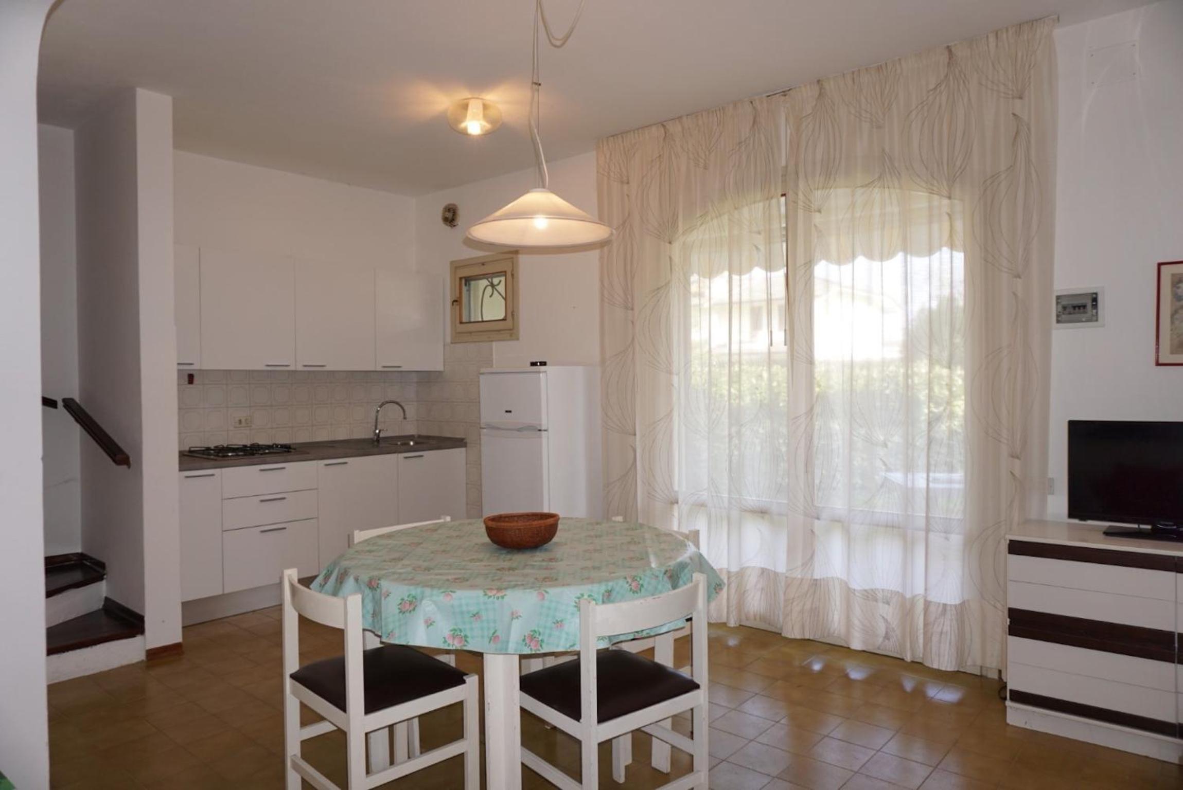 Holiday home with garden and shared pool