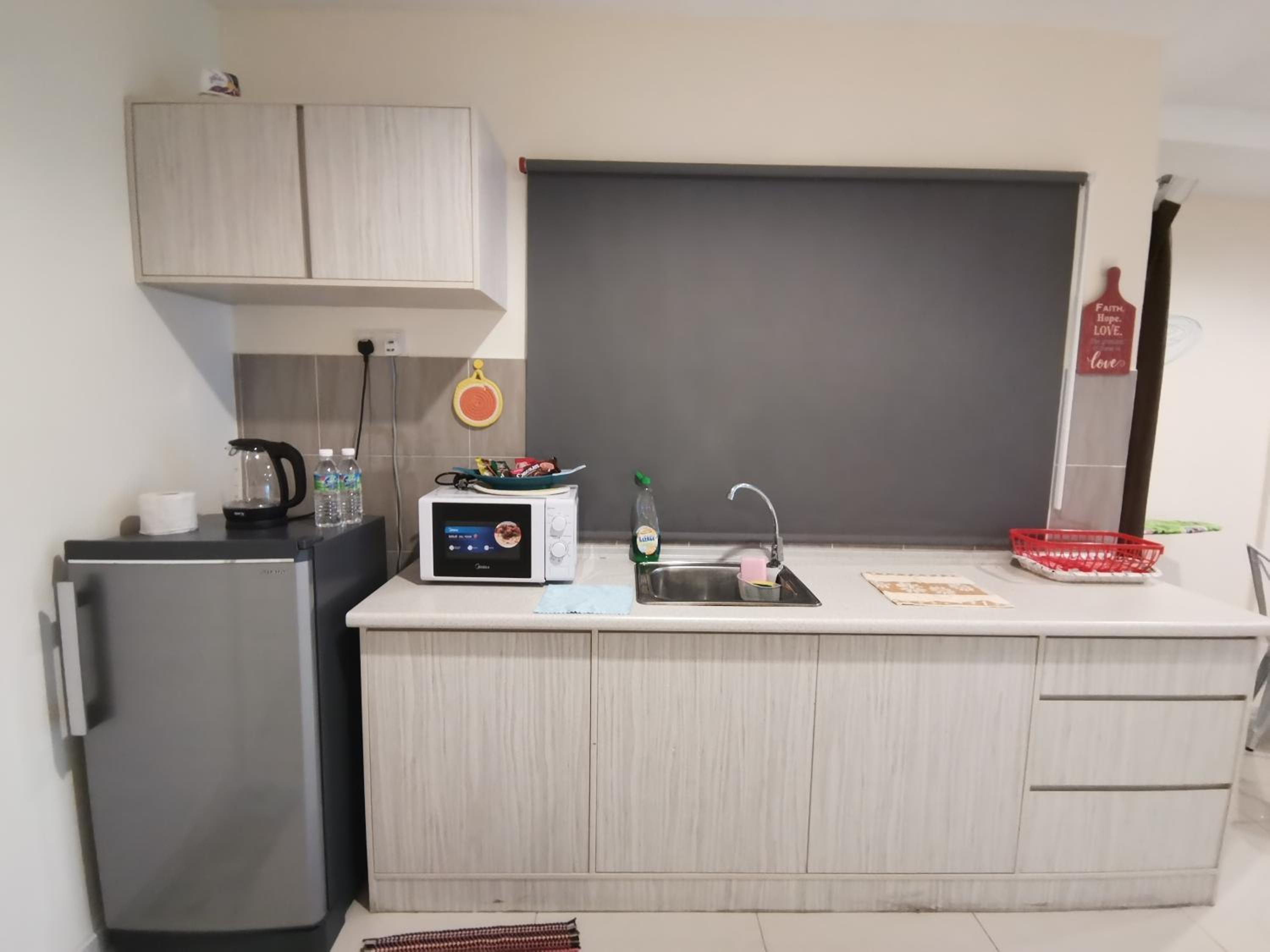 Peaceful 1-bedroom unit at Marina Island by JoMy Homestay photo 2