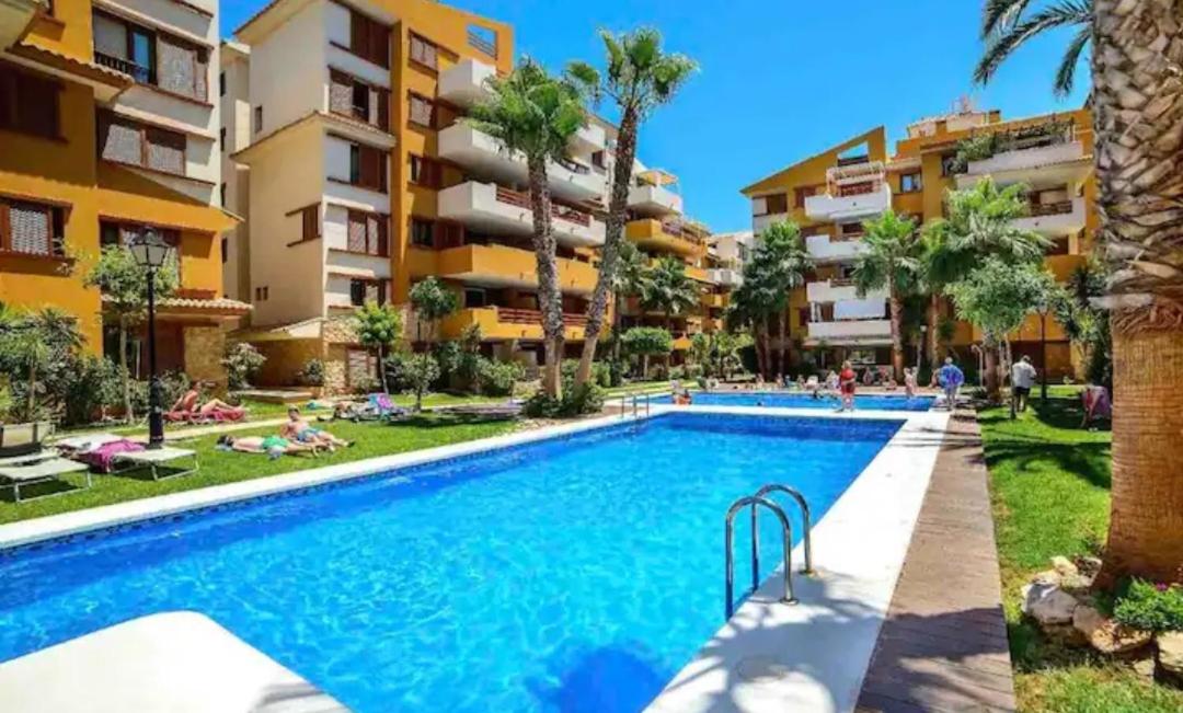 Hotel Turquesa Apartment,Punta Prima ,2 bed, 4 swimming pools and cabriolet Peugeot 307 included - Image 1