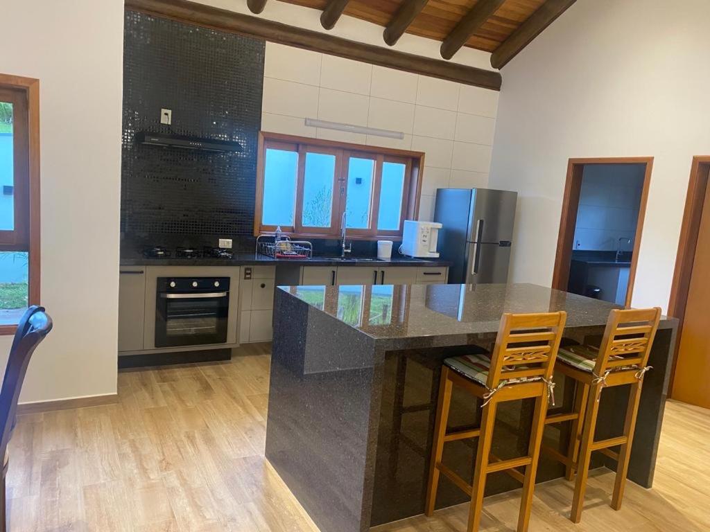 Casa de luxo em Monte Verde