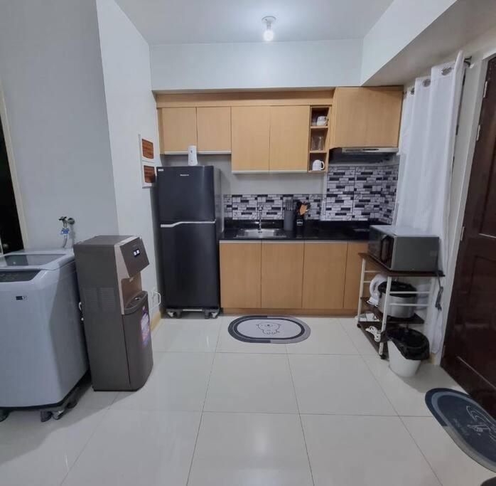 2BR Condo Unit with Washer, INET, Desk Space, ground floor view 5