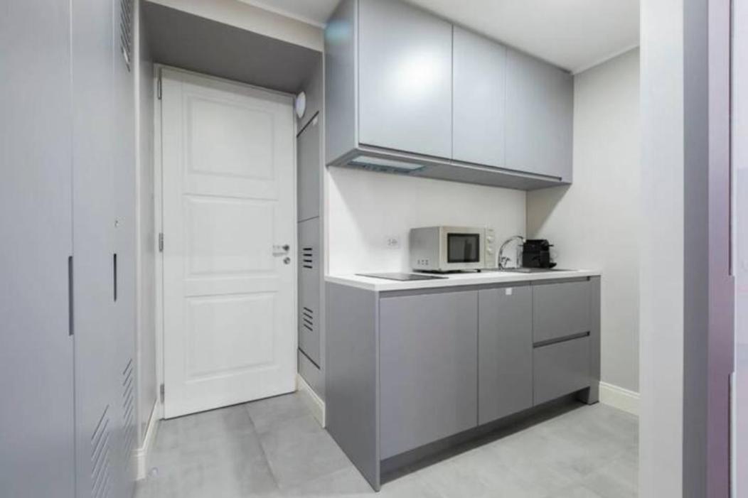 Croce Apartments en Rome — kitchen