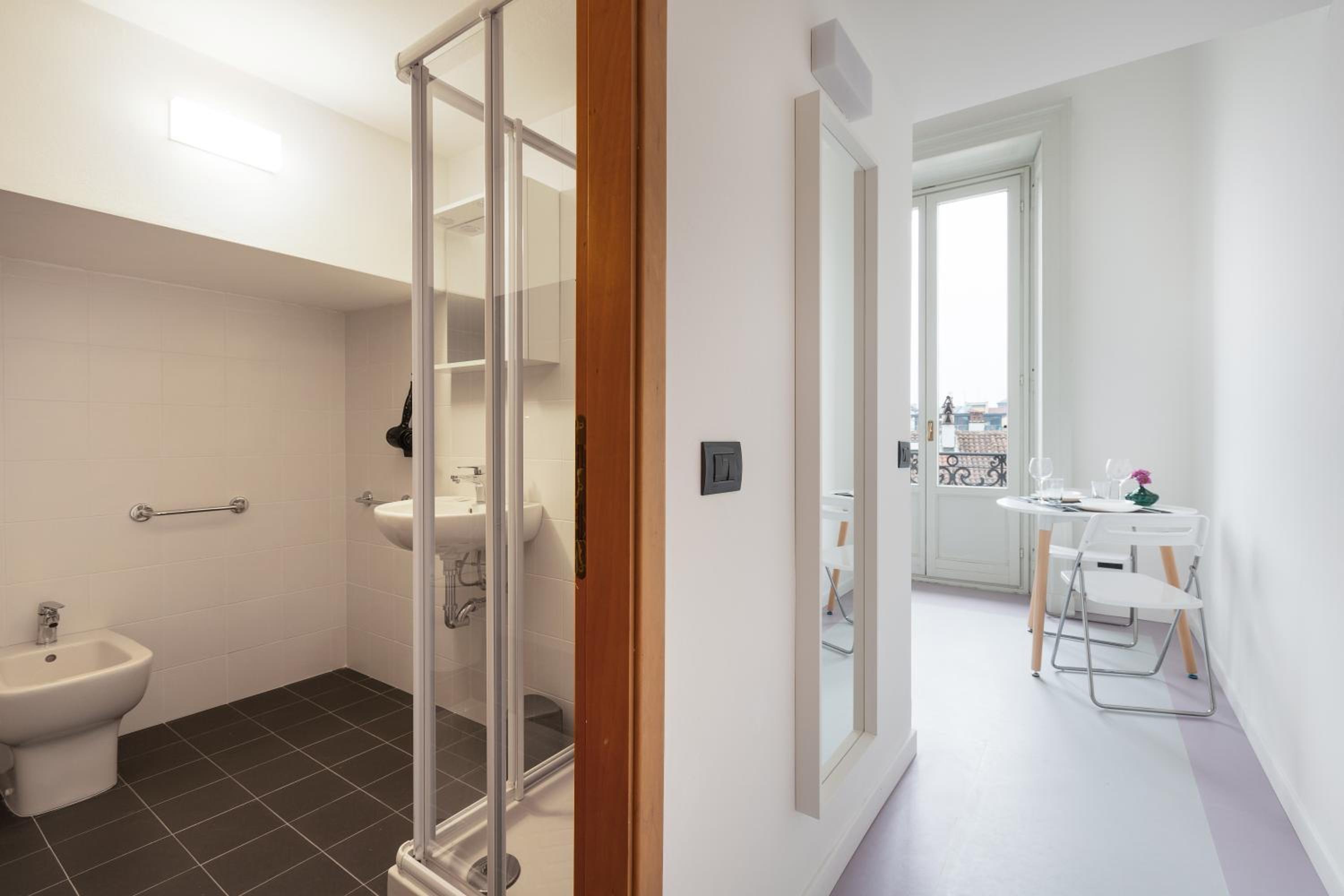 GuestHost - Central Studio APTS Milano-Corso Magenta
