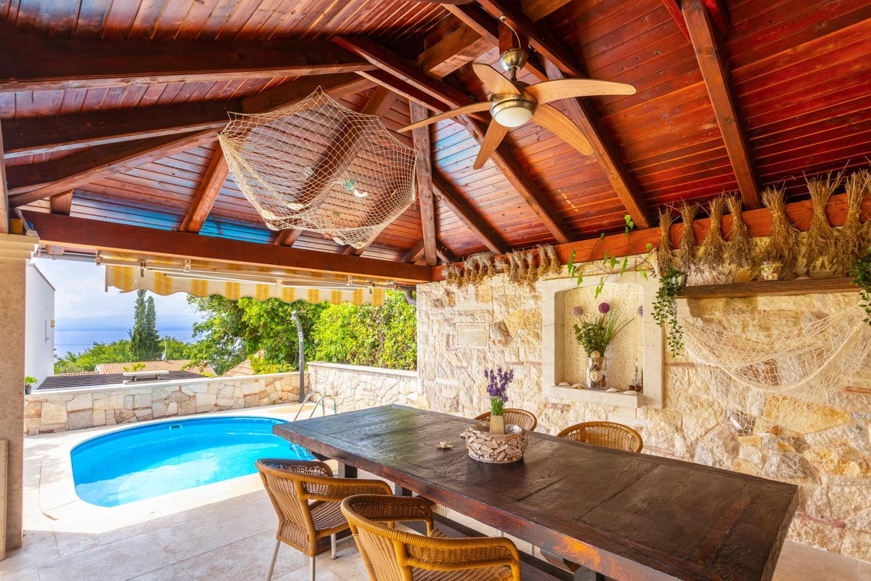 Mediterranean terrace with bbq, swimming pool and sea view