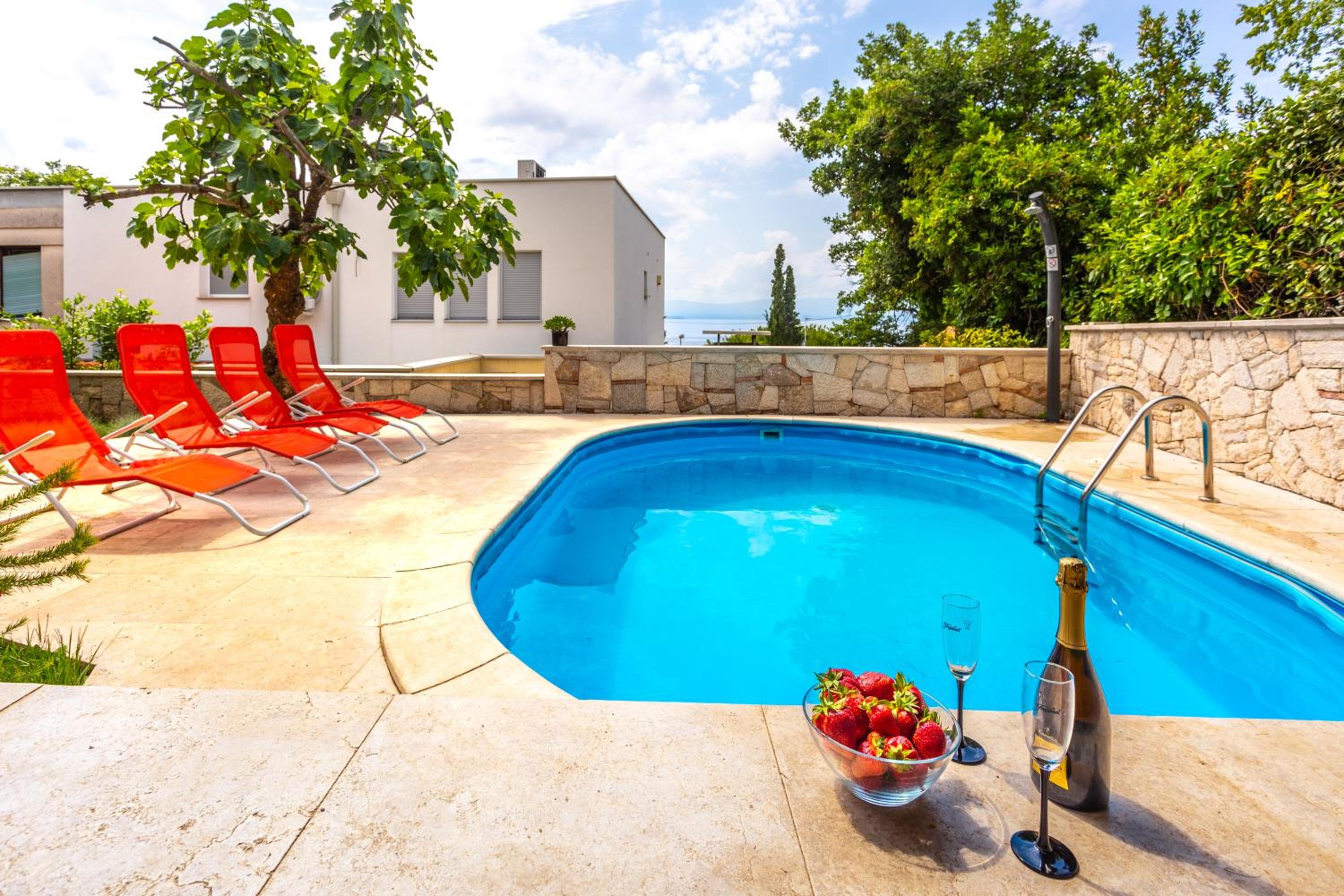 Mediterranean terrace with bbq, swimming pool and sea view
