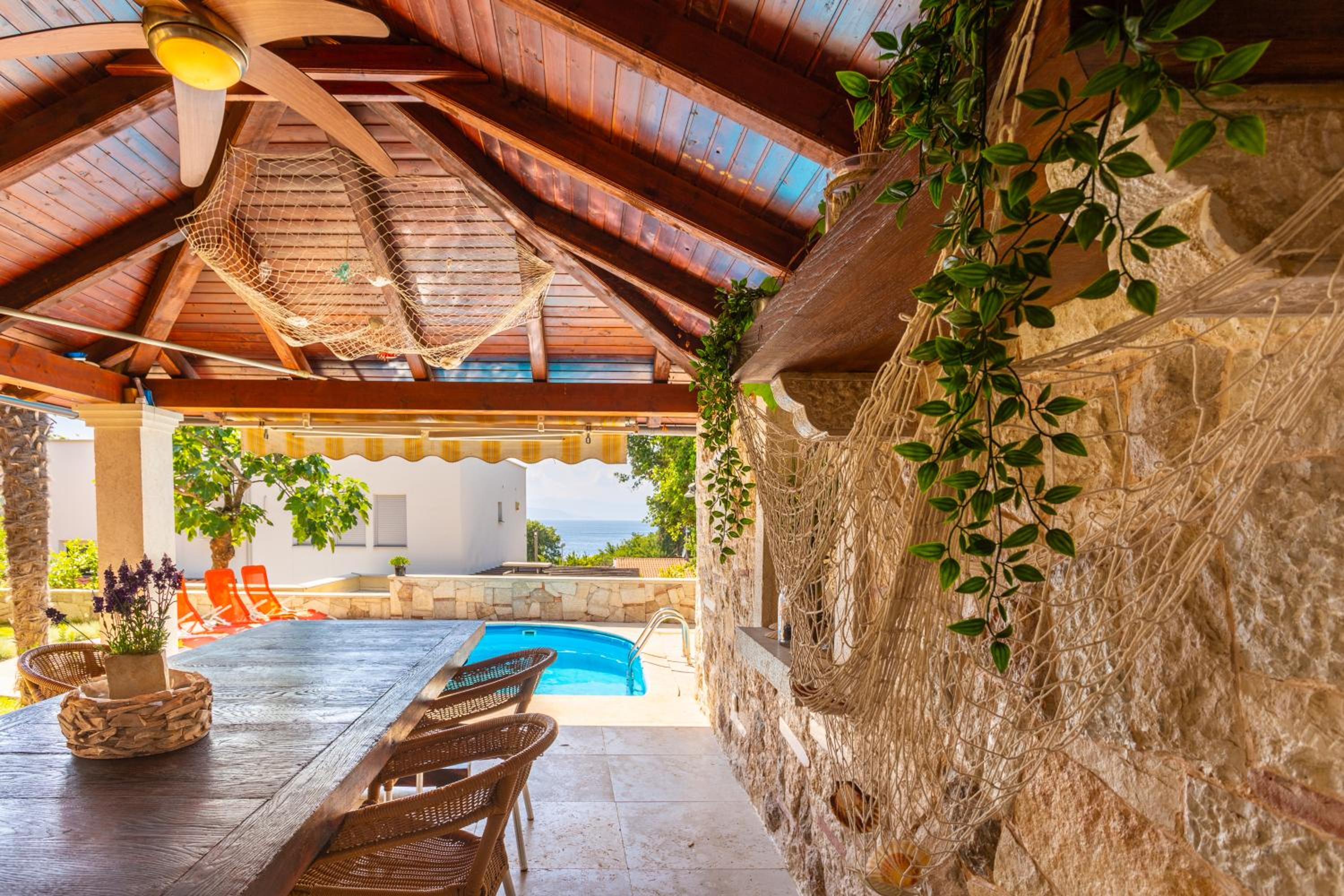 Mediterranean terrace with bbq, swimming pool and sea view