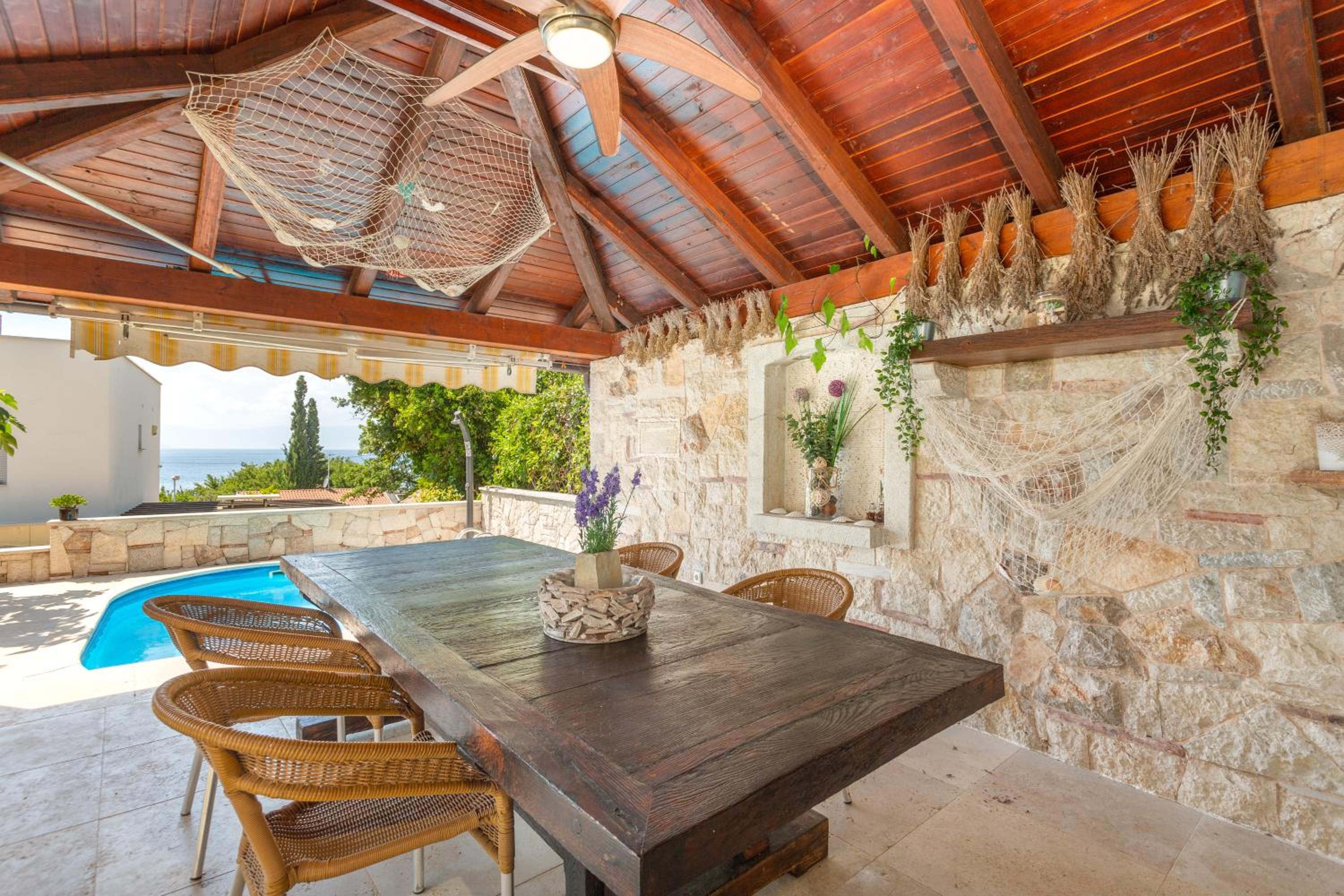Mediterranean terrace with bbq, swimming pool and sea view