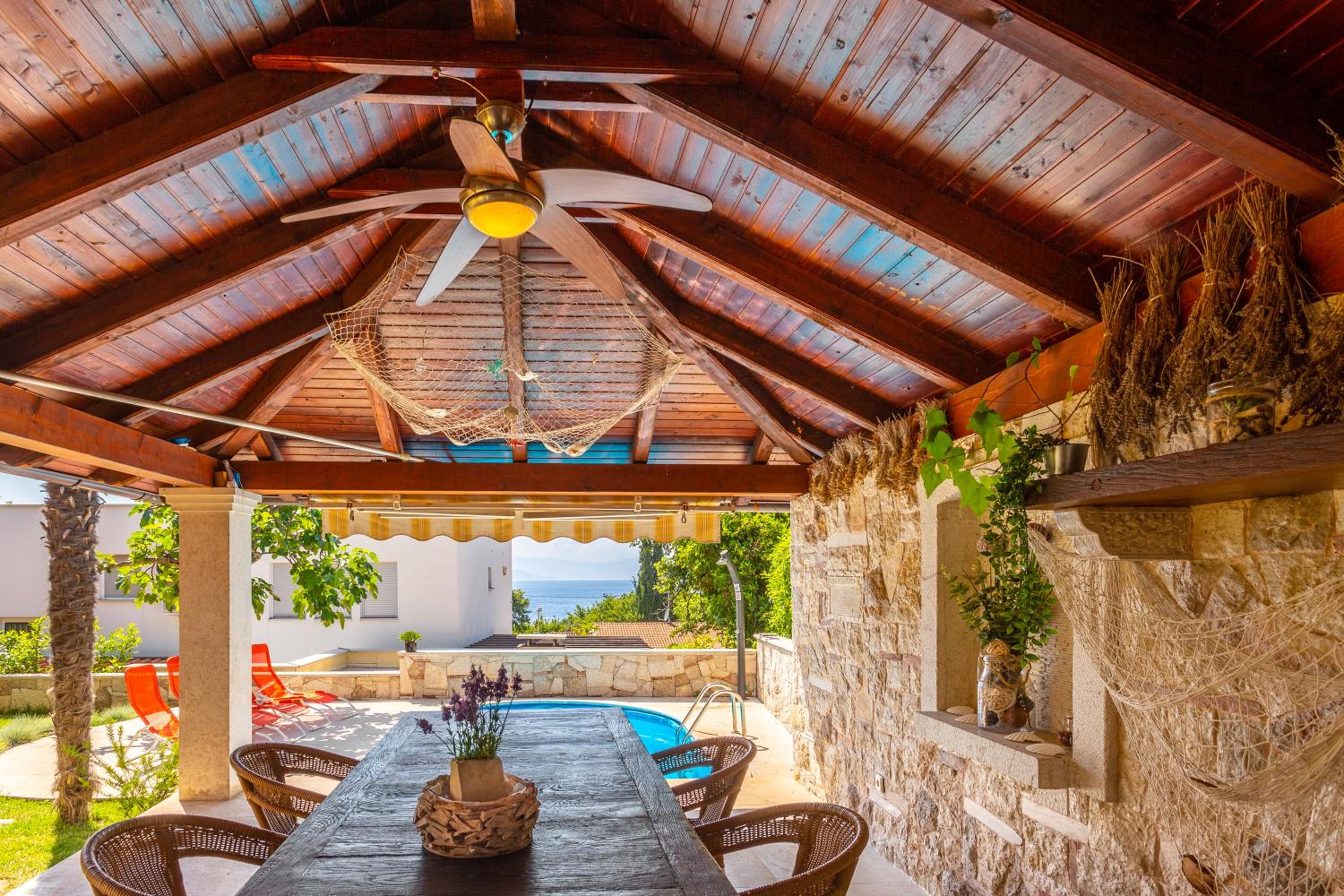 Mediterranean terrace with bbq, swimming pool and sea view