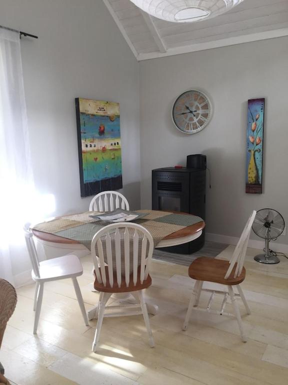 Cozy ,artistic cottage in a garden setting close to the beach and hiking trails.