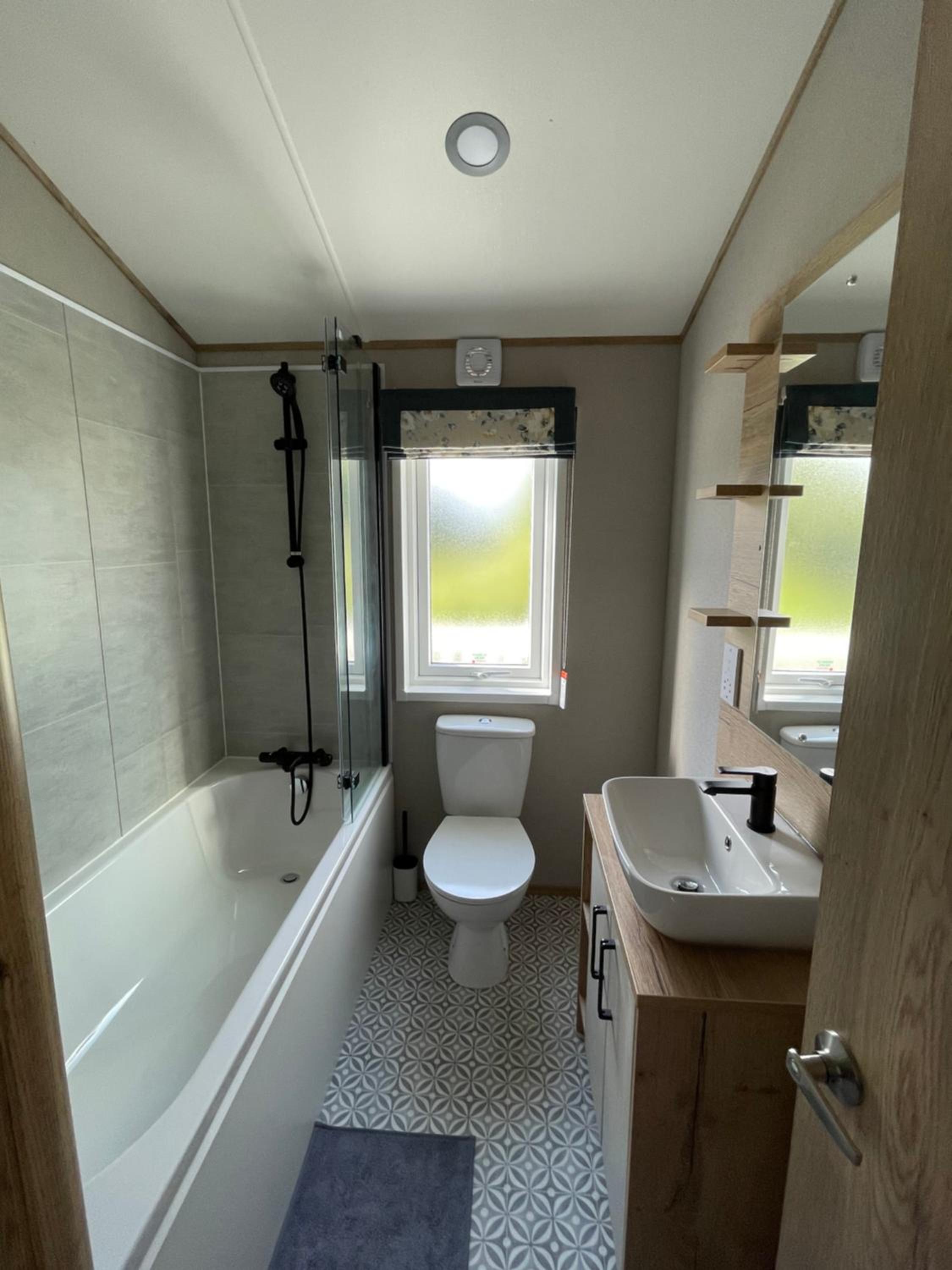 Chichester Lakeside Holiday Park Lakefront Lodge