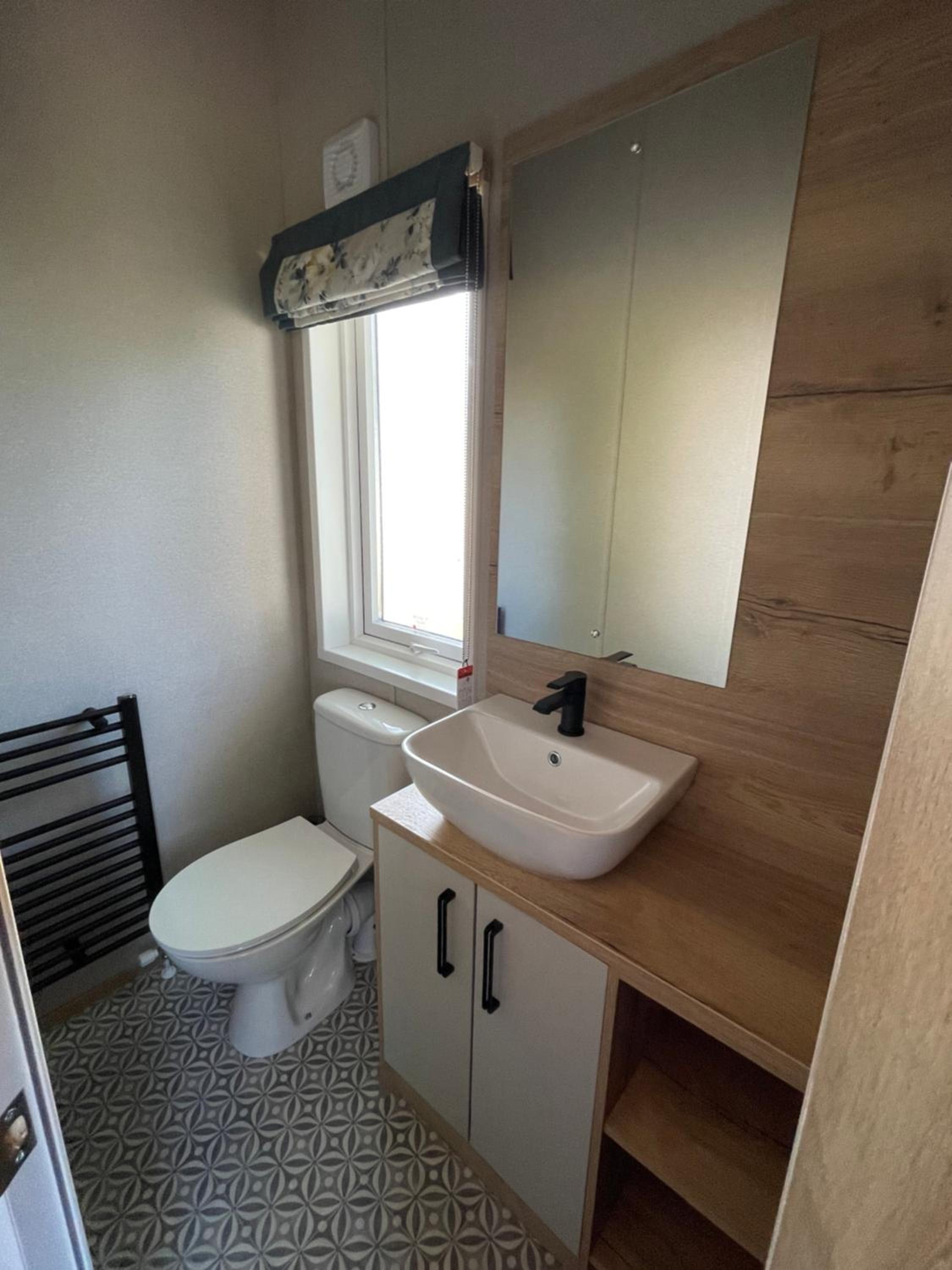 Chichester Lakeside Holiday Park Lakefront Lodge