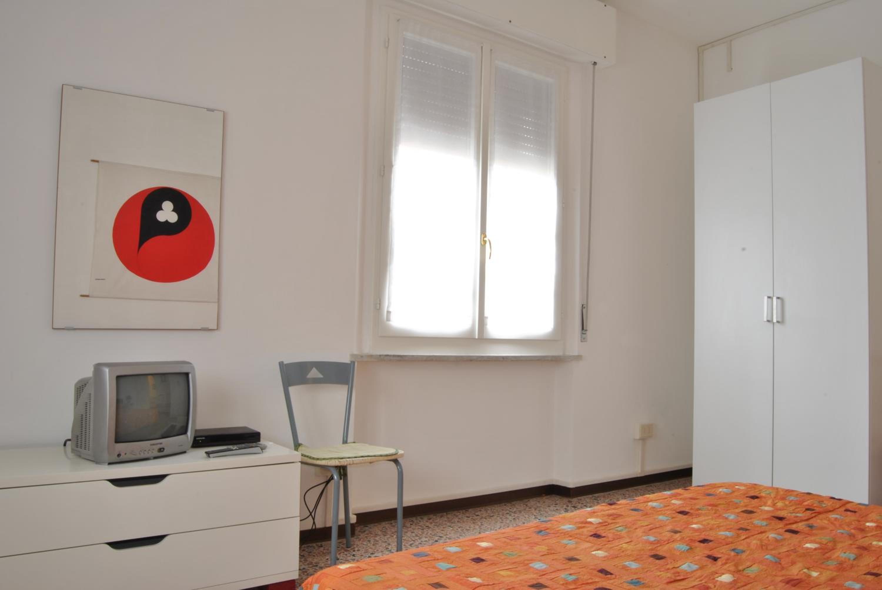 Lombardi Abbeveratoia en Parma — hotel room