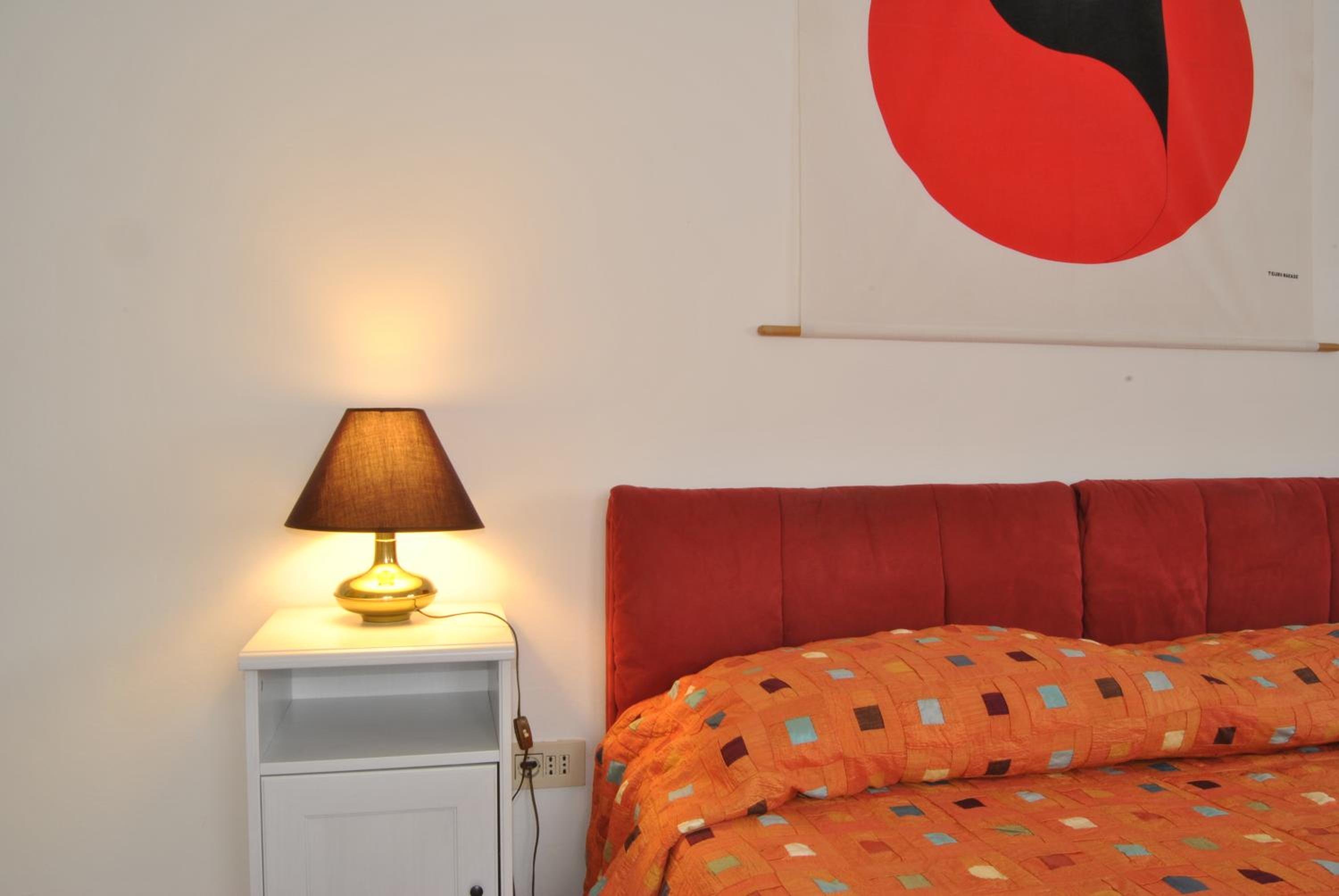 Lombardi Abbeveratoia en Parma — hotel room