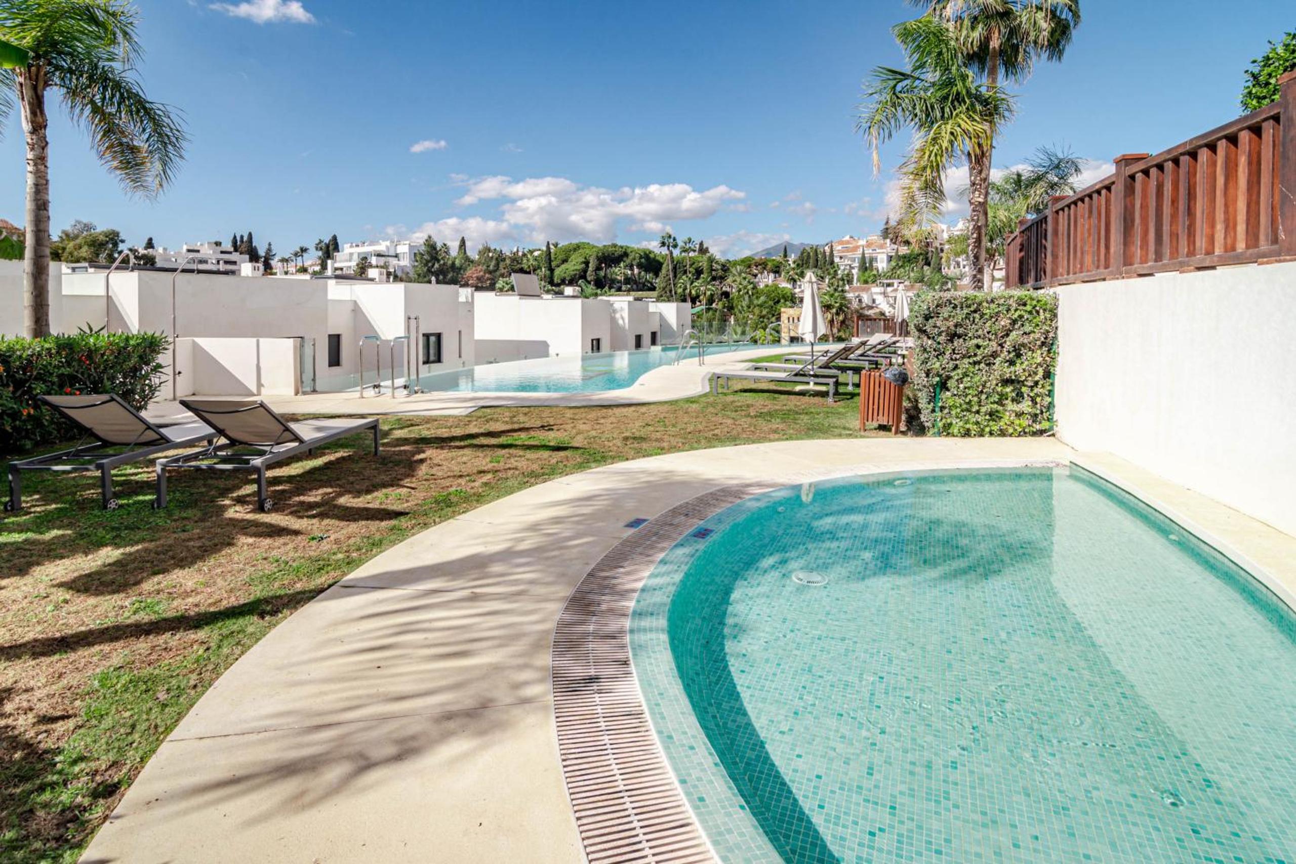 Luxury 3 bedroom townhouse on Marbellas Golden Mile with walking distance Puerto Banus