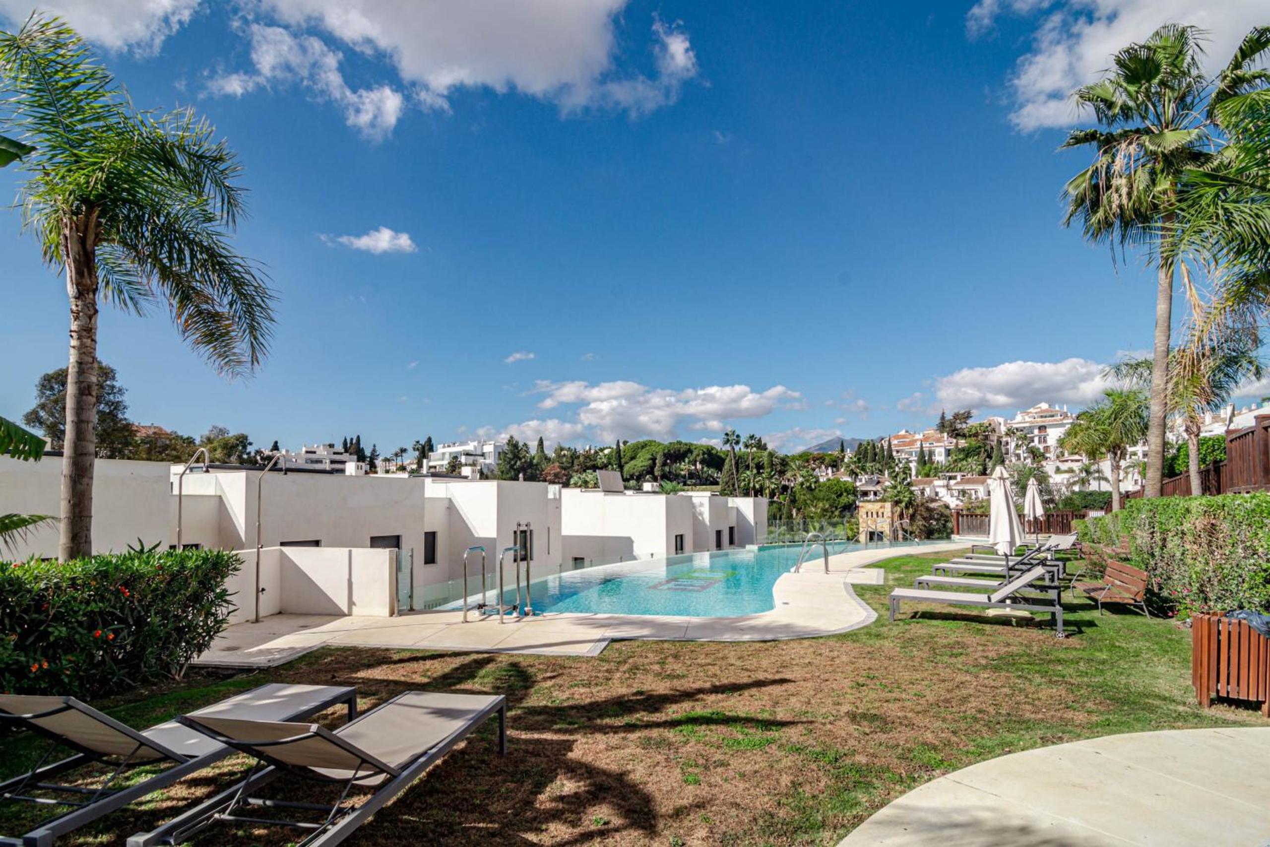 Luxury 3 bedroom townhouse on Marbellas Golden Mile with walking distance Puerto Banus