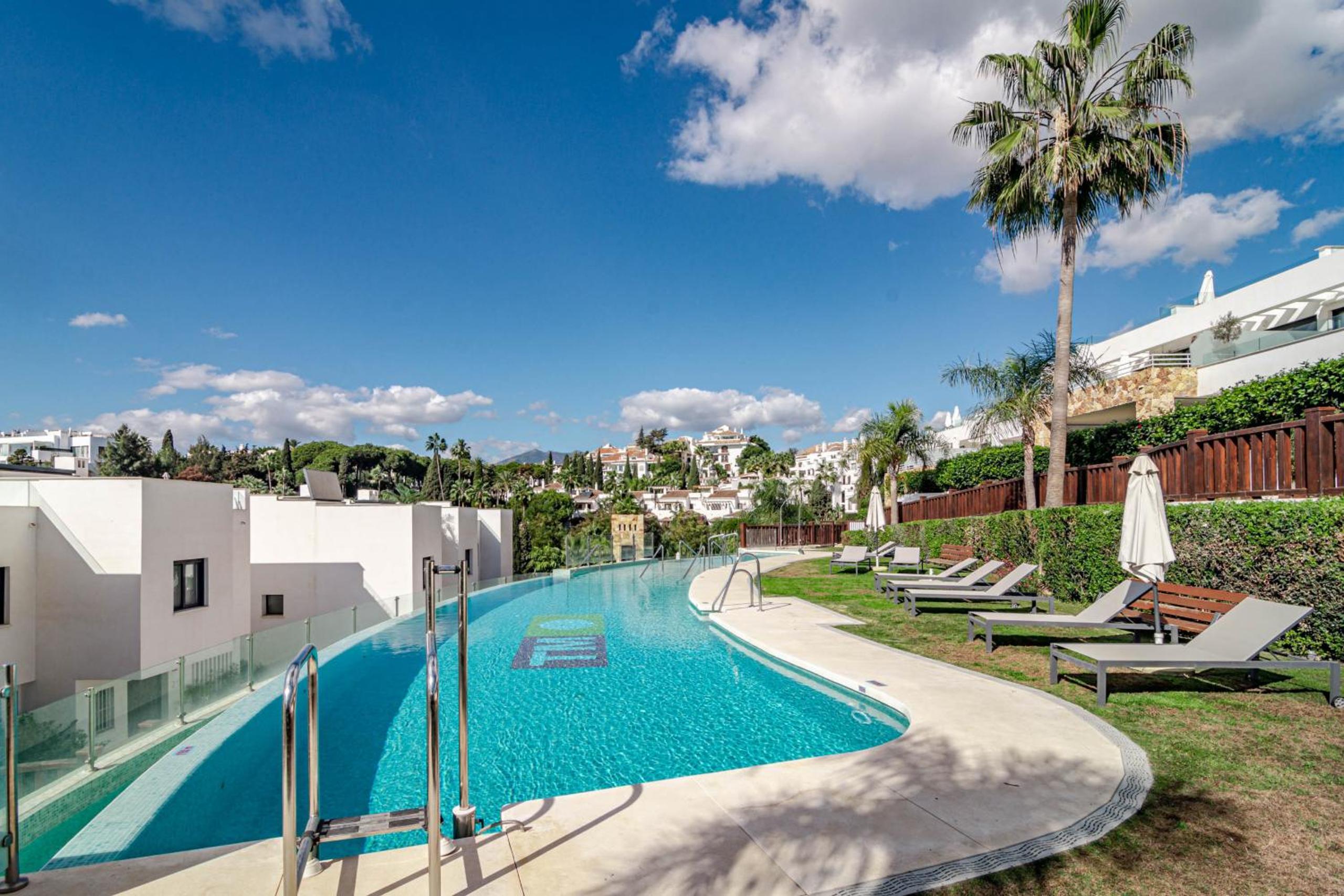 Luxury 3 bedroom townhouse on Marbellas Golden Mile with walking distance Puerto Banus