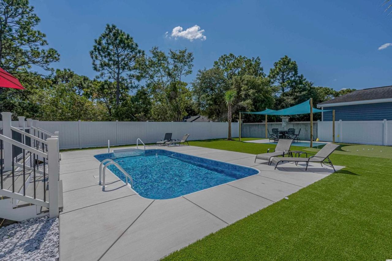 Immaculate Home With Putting Green and Private Pool! Pet Friendly 6 Bedroom- 4 Bath Duplex A&B view 5