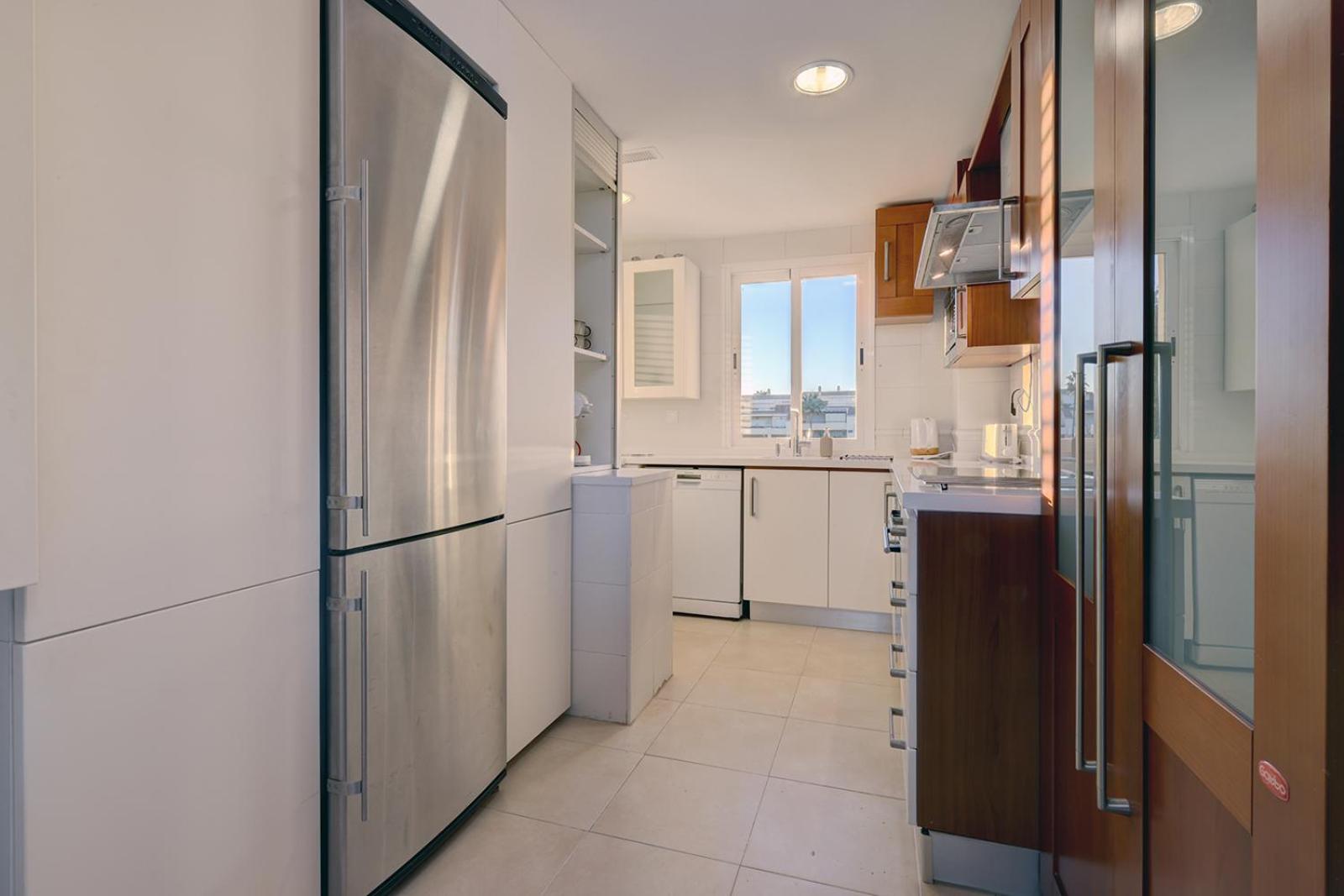 Bright Nordic style penthouse in beachside resort