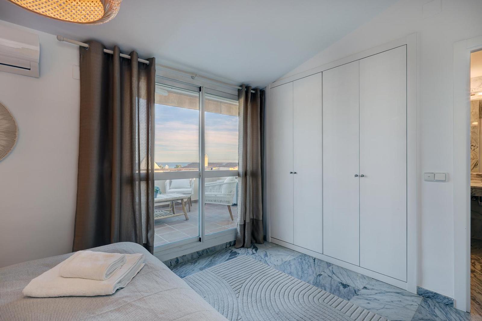 Bright Nordic style penthouse in beachside resort