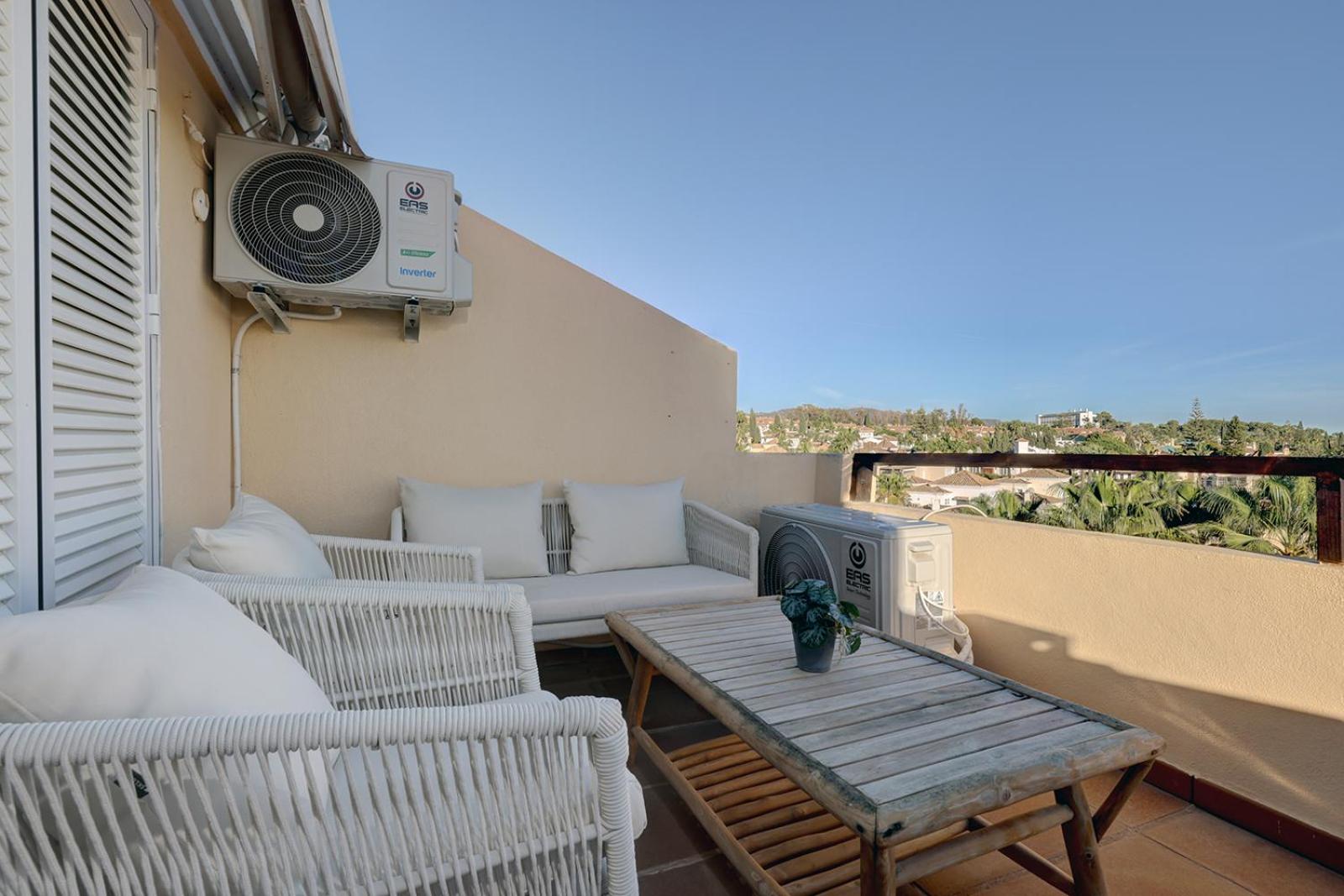 Bright Nordic style penthouse in beachside resort