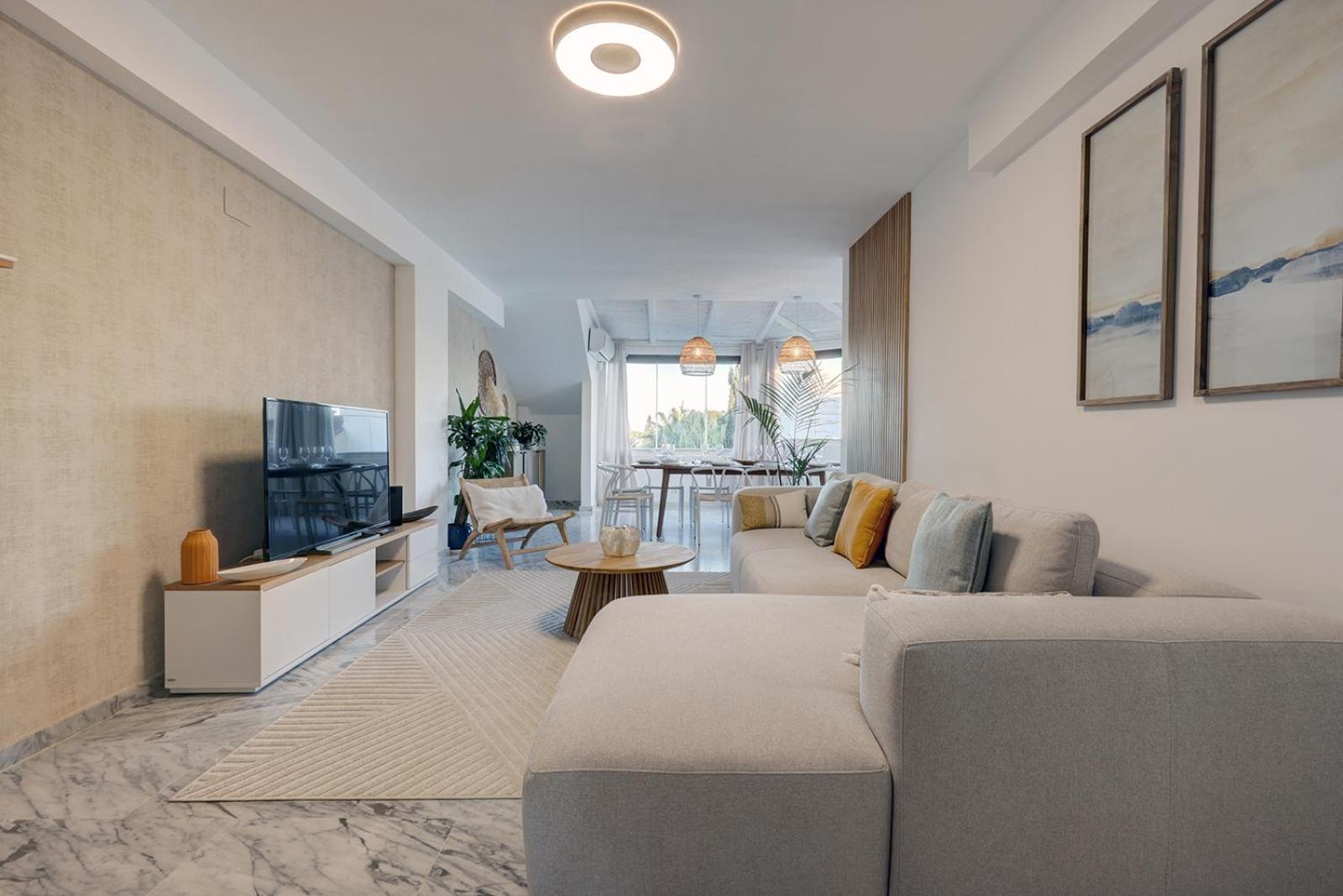 Bright Nordic style penthouse in beachside resort