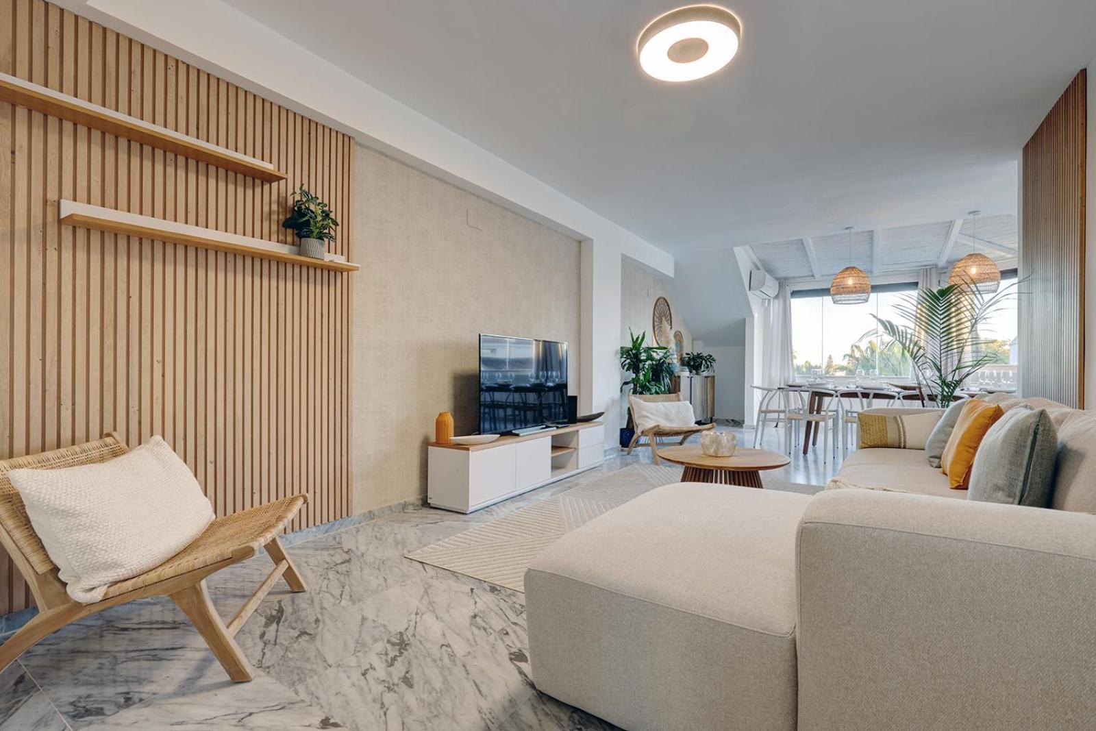 Bright Nordic style penthouse in beachside resort