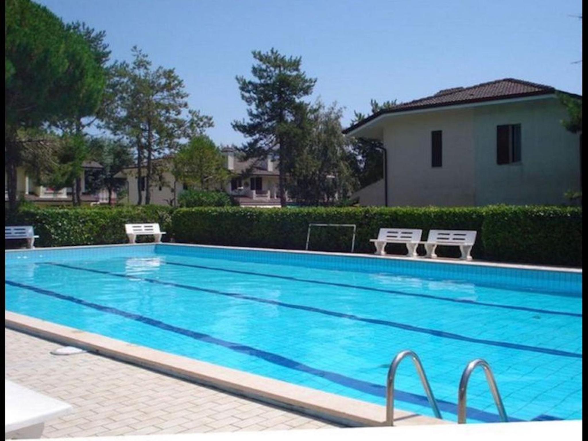 Holiday home with garden and shared pool