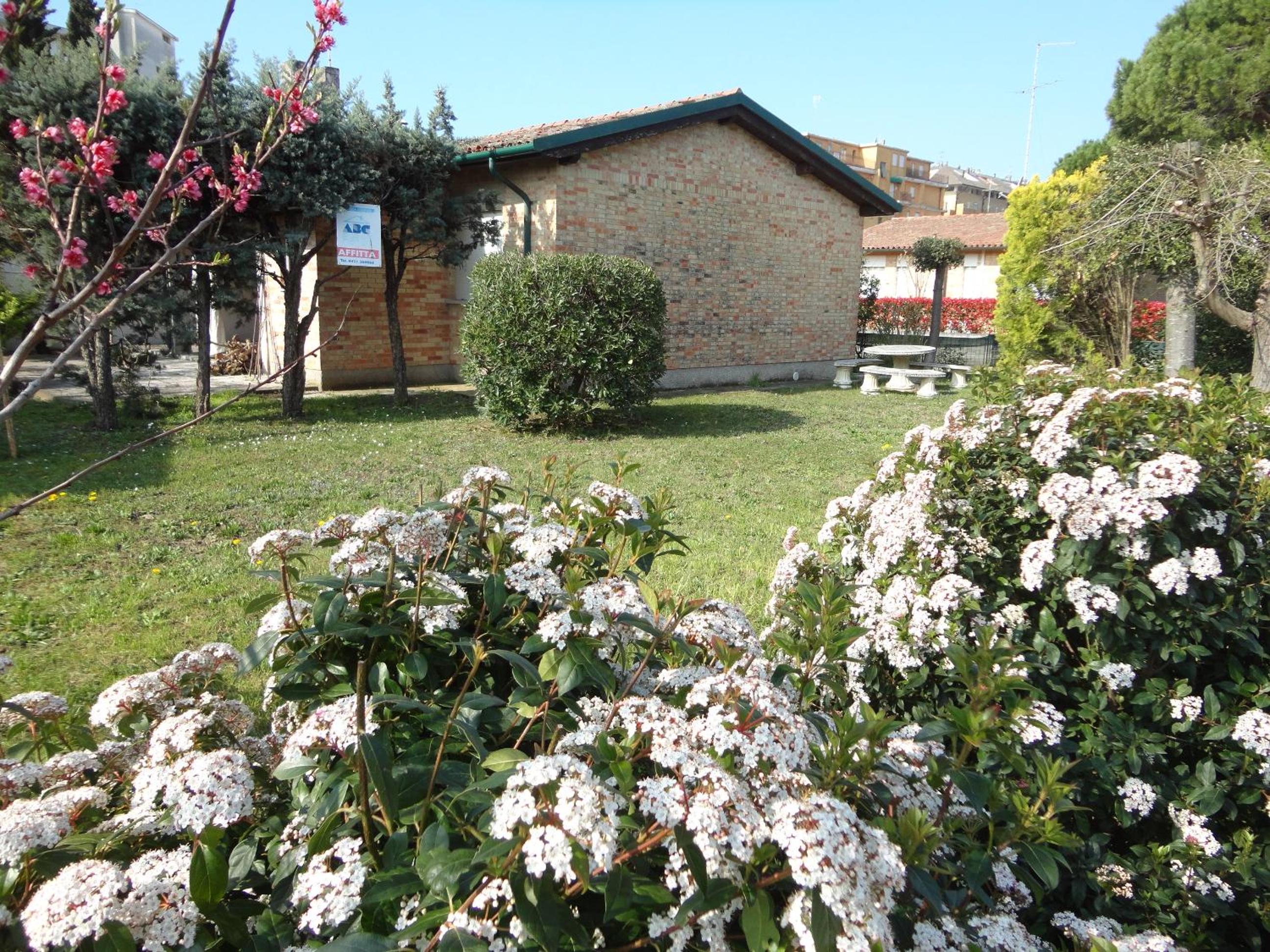 Seaside villa surrounded by a garden